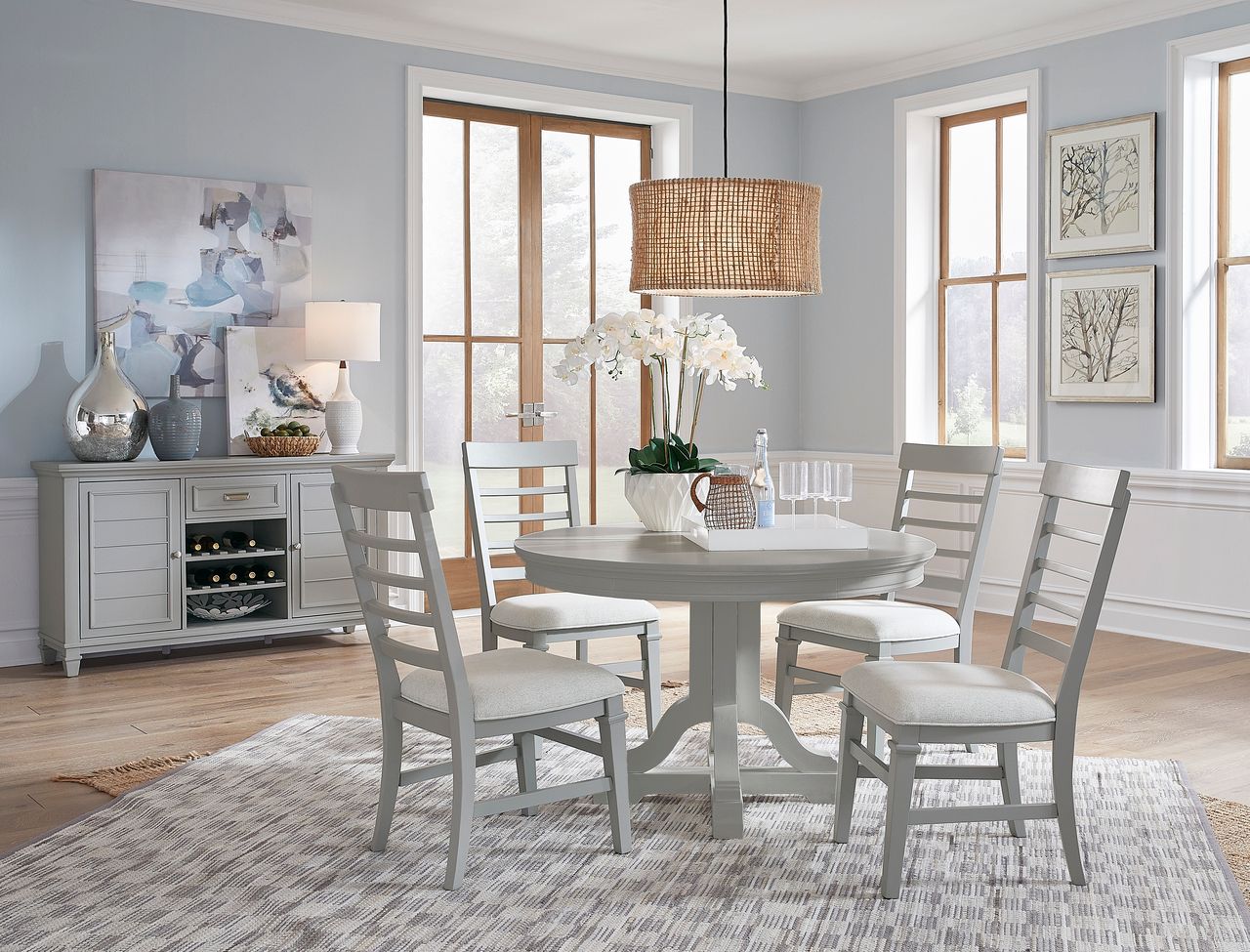 The appearance of Charleston Extendable Round Dining Set In Harbor Gray designed by Magnussen in the traditional interior design. This harbor gray piece of furniture was selected by 1StopBedrooms from Charleston Collection to add a touch of cosiness and style into your home. Sku: D5611-22GY;D5611-62GY. Table Top Shape: Round. Size: 48". Material: Hardwood.