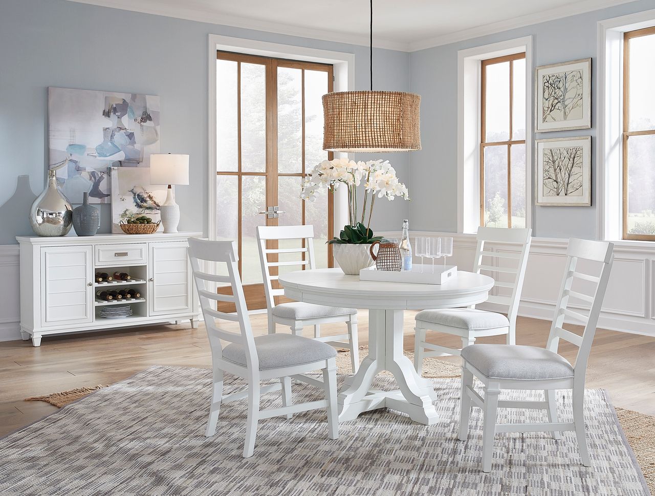 The appearance of Charleston Extendable Round Dining Set In White Dove designed by Magnussen in the traditional interior design. This white dove piece of furniture was selected by 1StopBedrooms from Charleston Collection to add a touch of cosiness and style into your home. Sku: D5611-22WH;D5611-62WH. Table Top Shape: Round. Size: 48". Material: Hardwood.