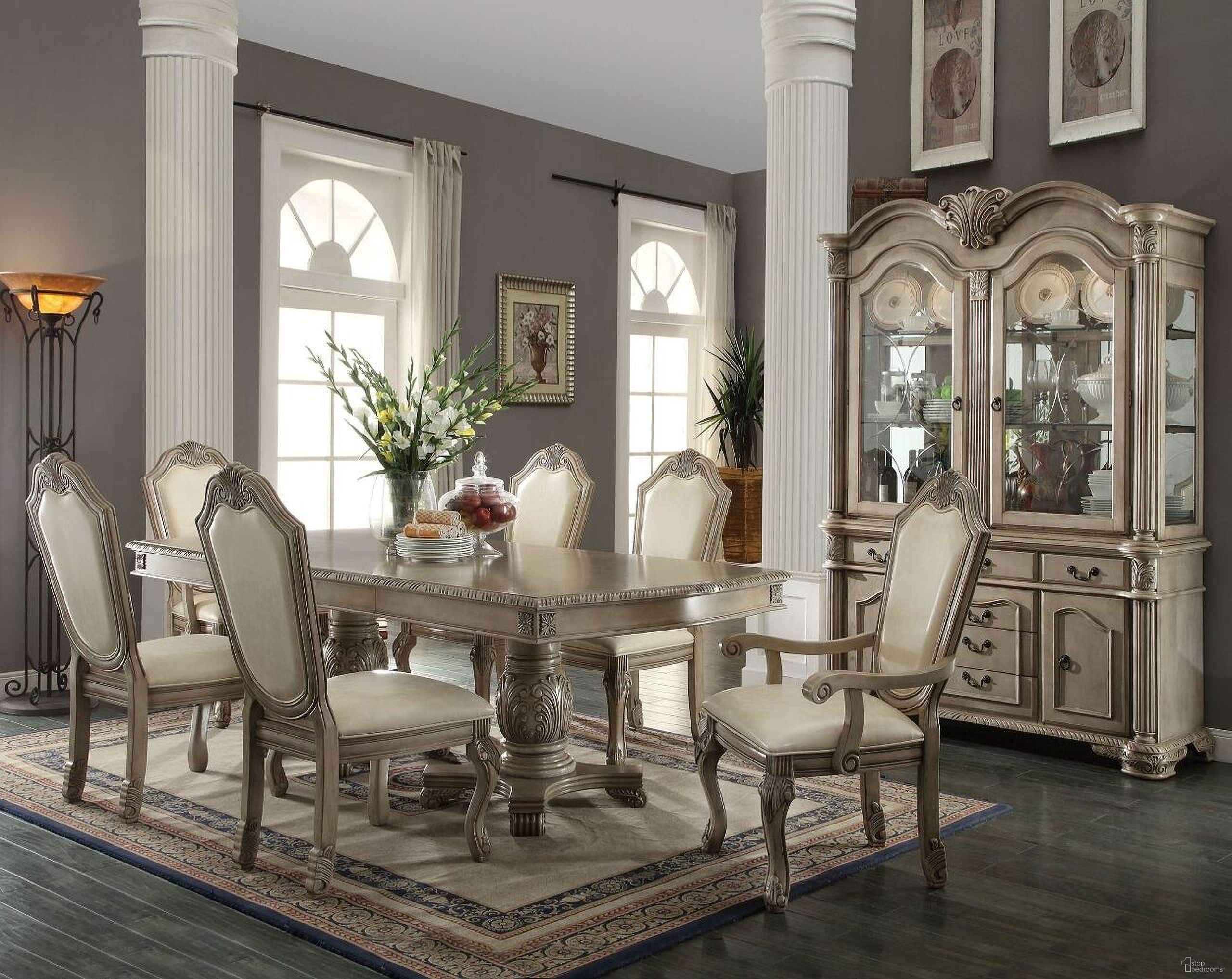 The appearance of Chateau De Ville Dining Room Set In Antique White designed by ACME in the transitional interior design. This antique white piece of furniture was selected by 1StopBedrooms from Chateau De Ville Collection to add a touch of cosiness and style into your home. Sku: 64065A-T;64066A-ST;64067A. Table Base Style: Double Pedestal. Material: Wood. Table Top Shape: Rectangular. Size: 46" x 96".