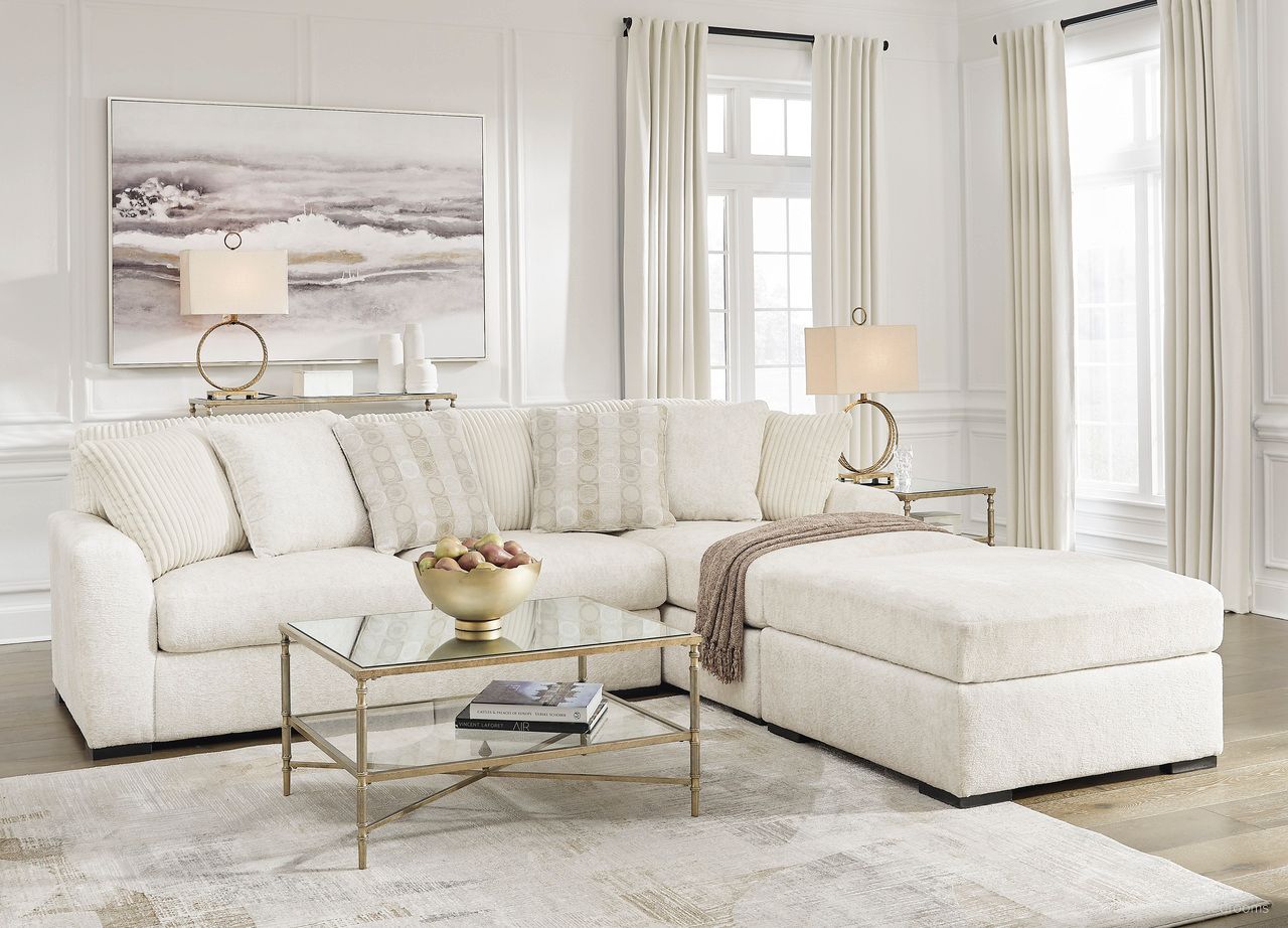 The appearance of Chessington 2-Piece Sectional and Ottoman In Ivory designed by Signature Design by Ashley in the modern / contemporary interior design. This ivory piece of furniture was selected by 1StopBedrooms from Chessington Collection to add a touch of cosiness and style into your home. Sku: 6190417;6190466;6190408. Material: Corduroy.