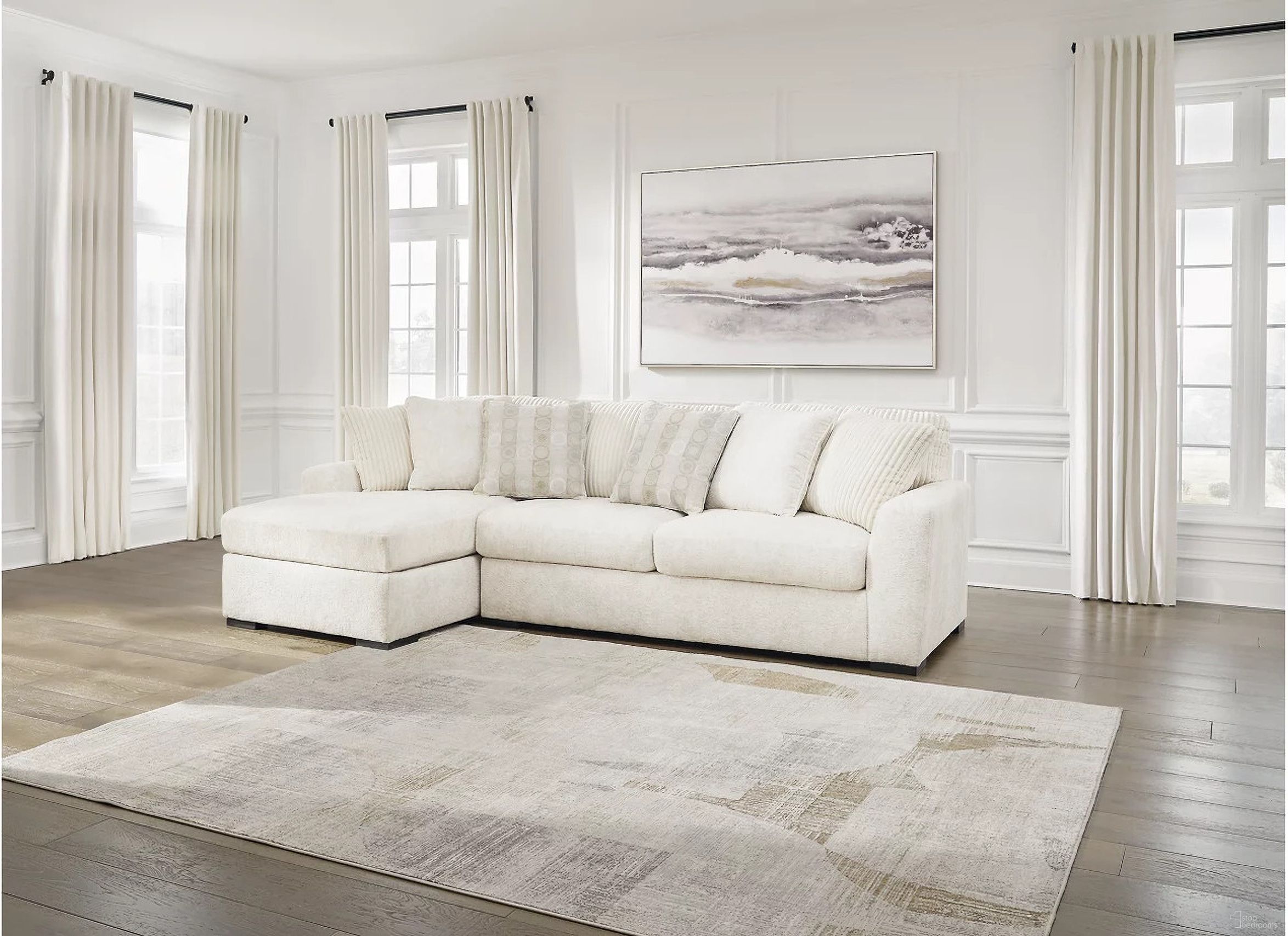 The appearance of Chessington 2-Piece LAF Sectional with Chaise In Ivory designed by Signature Design by Ashley in the modern / contemporary interior design. This ivory piece of furniture was selected by 1StopBedrooms from Chessington Collection to add a touch of cosiness and style into your home. Sku: 6190467;6190416. Material: Polyester. Layout: L-Shape.