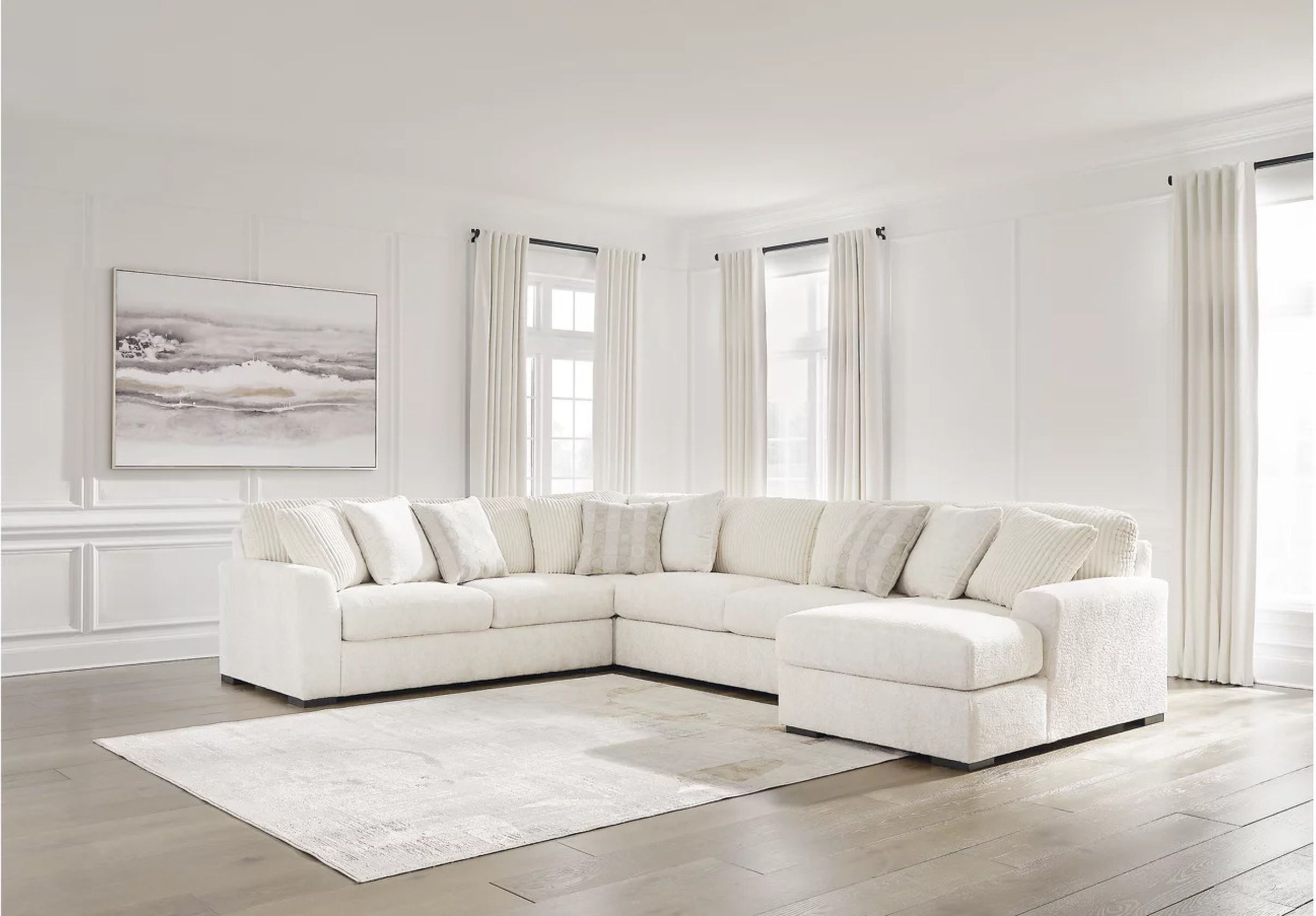 The appearance of Chessington 4-Piece Sectional with Chaise In Ivory designed by Signature Design by Ashley in the modern / contemporary interior design. This ivory piece of furniture was selected by 1StopBedrooms from Chessington Collection to add a touch of cosiness and style into your home. Sku: 6190466;6190434;6190477;6190417. Material: Polyester. Layout: U-Shape.