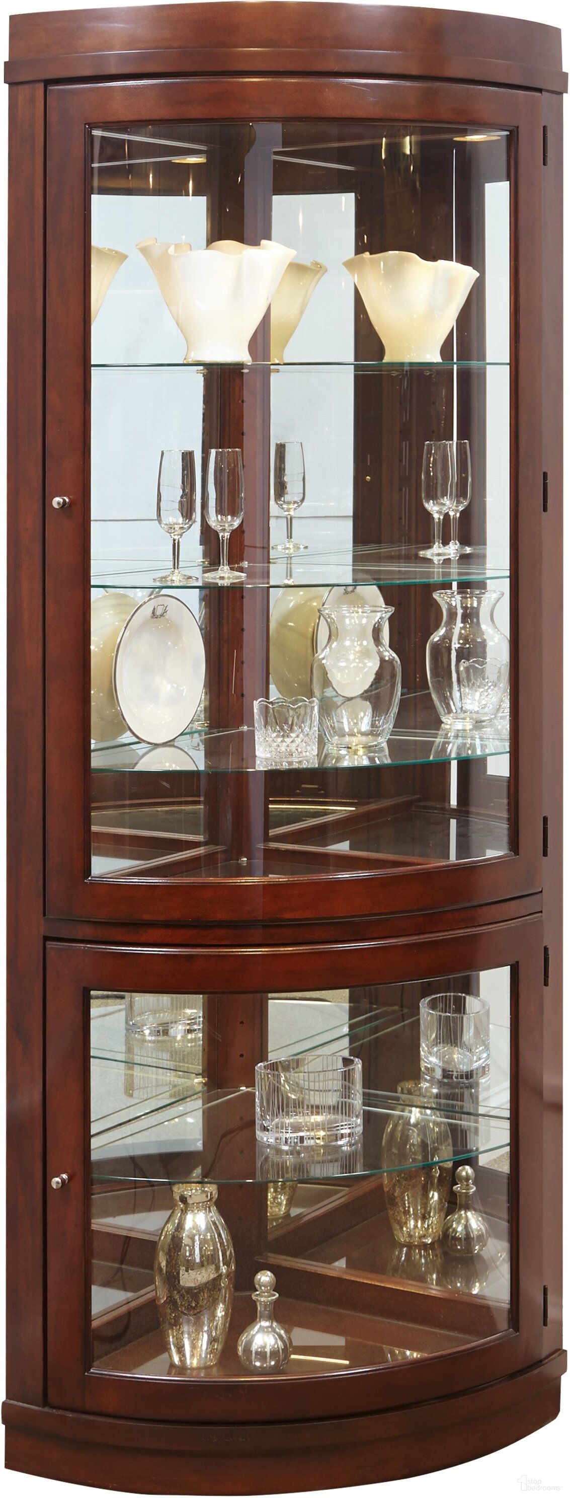 The appearance of Chocolate Cherry Corner Curio designed by Pulaski in the traditional interior design. This brown piece of furniture was selected by 1StopBedrooms from Curios Collection to add a touch of cosiness and style into your home. Sku: 20852. Material: Glass.