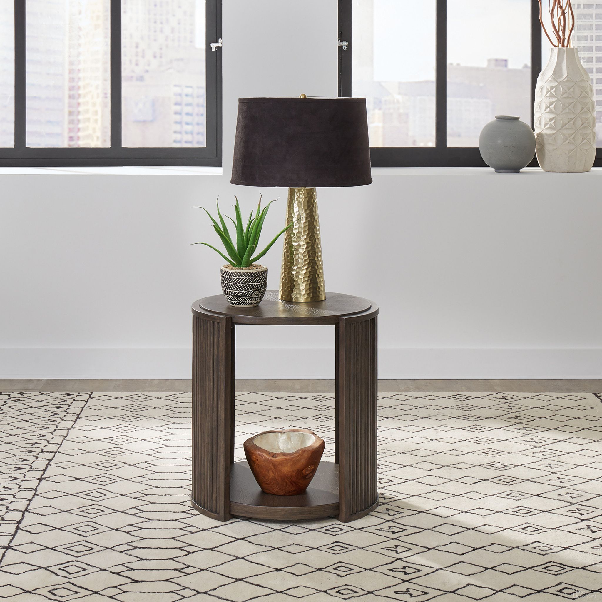The appearance of City View Round End Table In Brown designed by Liberty in the modern / contemporary interior design. This brown piece of furniture was selected by 1StopBedrooms from City View Collection to add a touch of cosiness and style into your home. Sku: 145-OT1020. Material: Rubberwood.