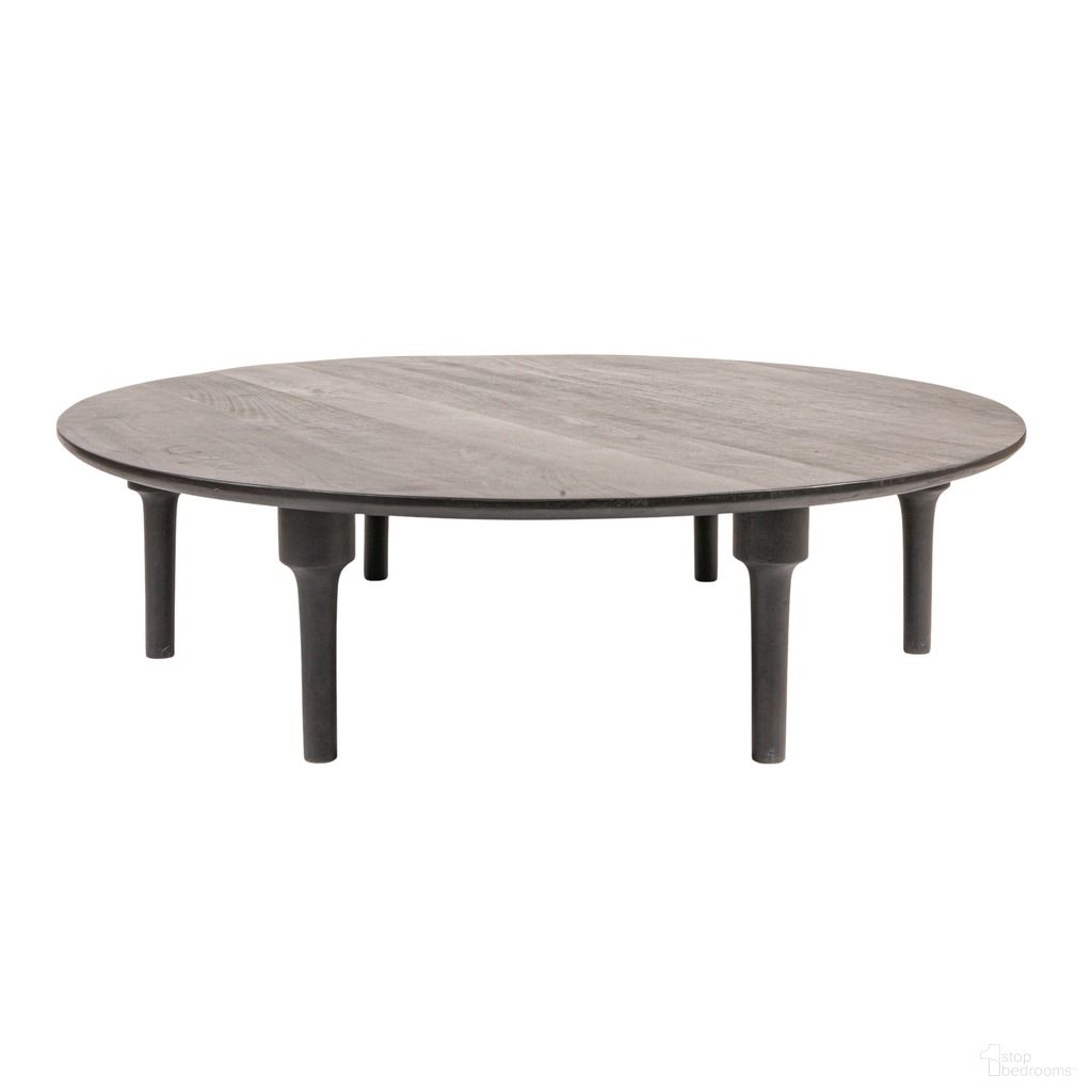 The appearance of Clarkson Oversized Round Mango Wood Coffee Table In Black designed by Rowena Interiors in the traditional interior design. This black piece of furniture was selected by 1StopBedrooms from Clarkson Collection to add a touch of cosiness and style into your home. Sku: EC2034. Material: Mango Wood.