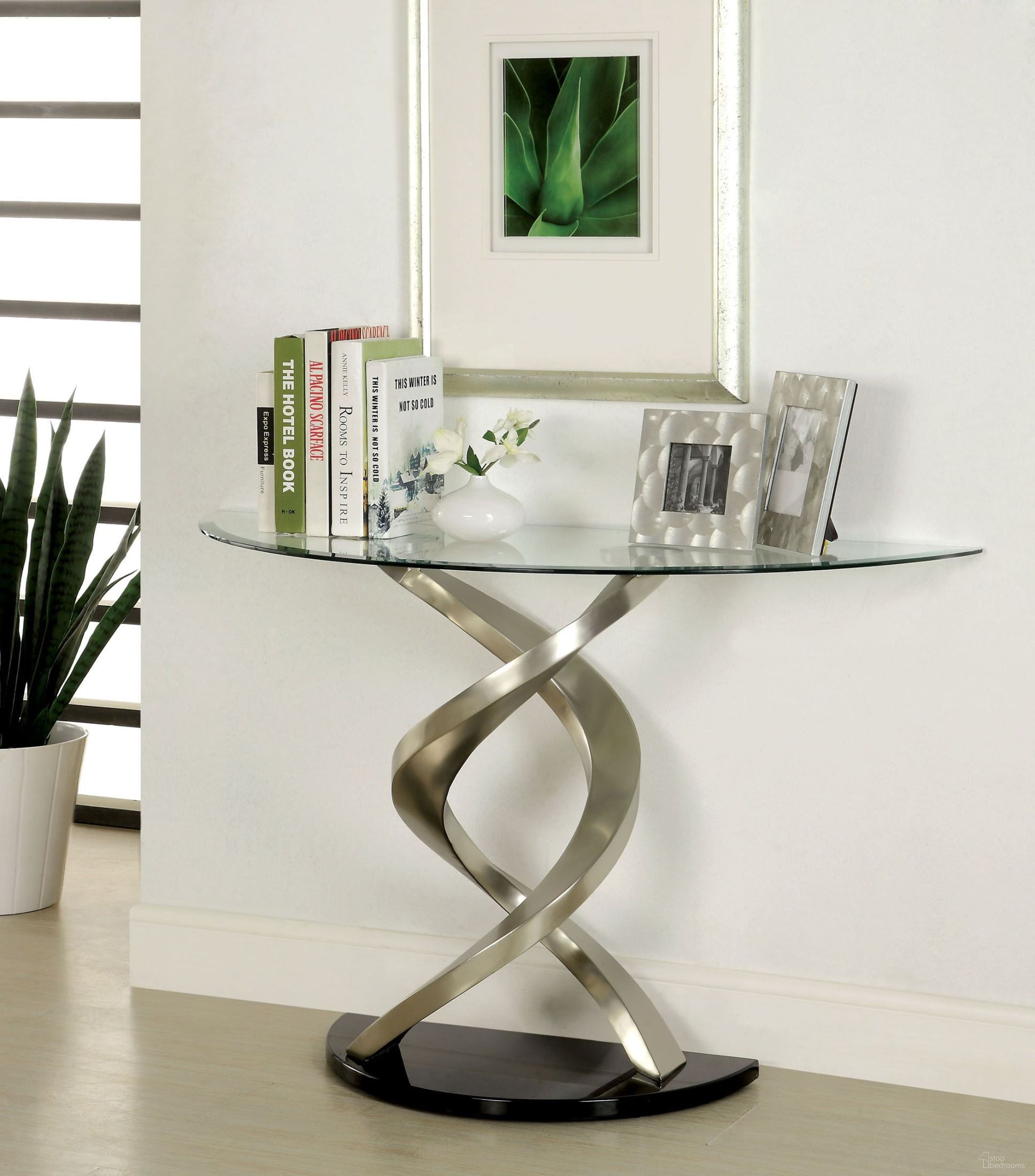 The appearance of Nova Satin Plated Sofa Table designed by Furniture of America in the modern / contemporary interior design. This silver piece of furniture  was selected by 1StopBedrooms from Nova Collection to add a touch of cosiness and style into your home. Sku: CM4729S-1;CM4729S-2. Material: Glass.