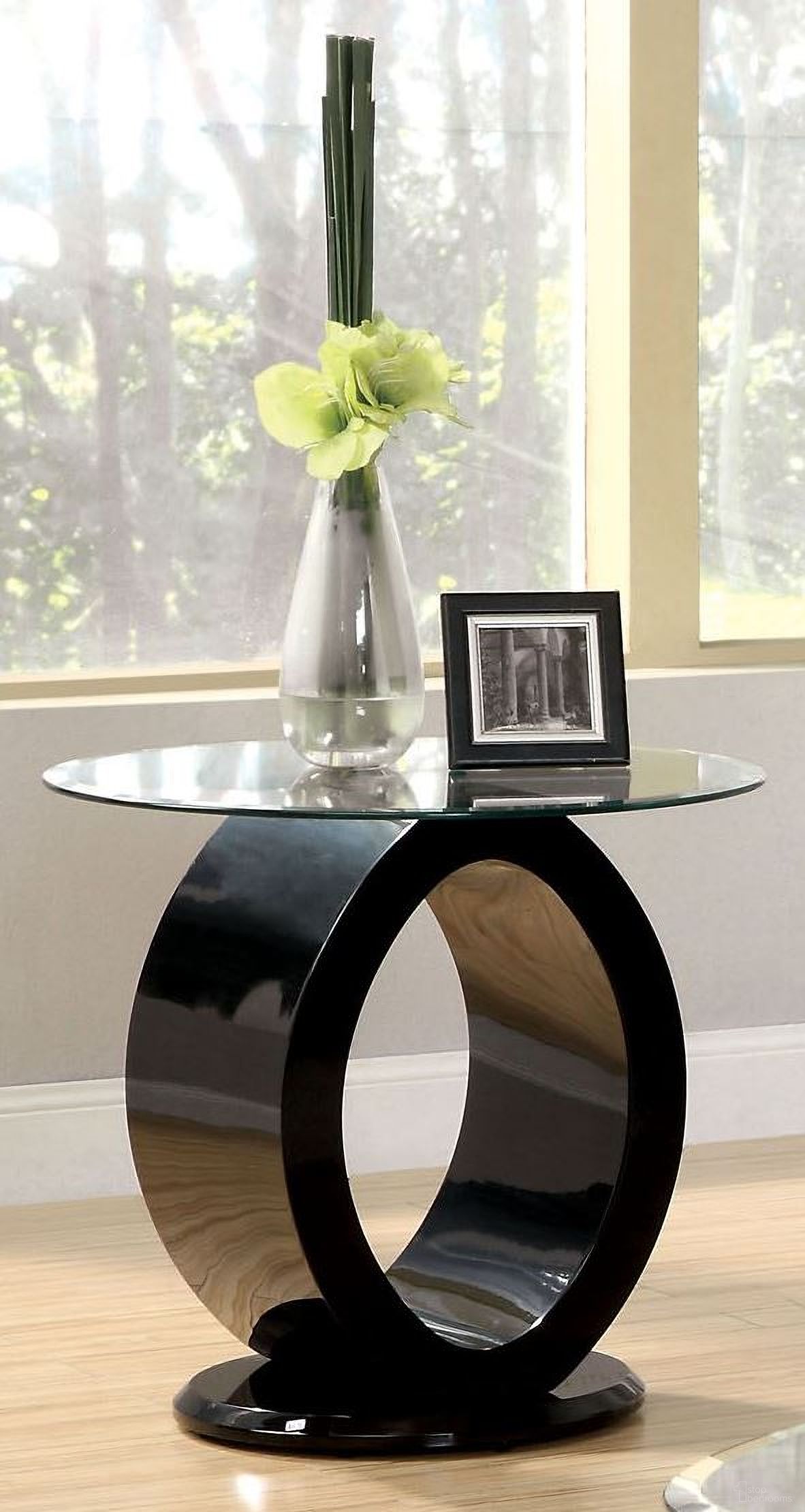The appearance of Lodia III Black End Table designed by Furniture of America in the modern / contemporary interior design. This black piece of furniture was selected by 1StopBedrooms from Lodia Collection to add a touch of cosiness and style into your home. Sku: CM4825BK-E-1;CM4825BK-E-2. Material: Glass.
