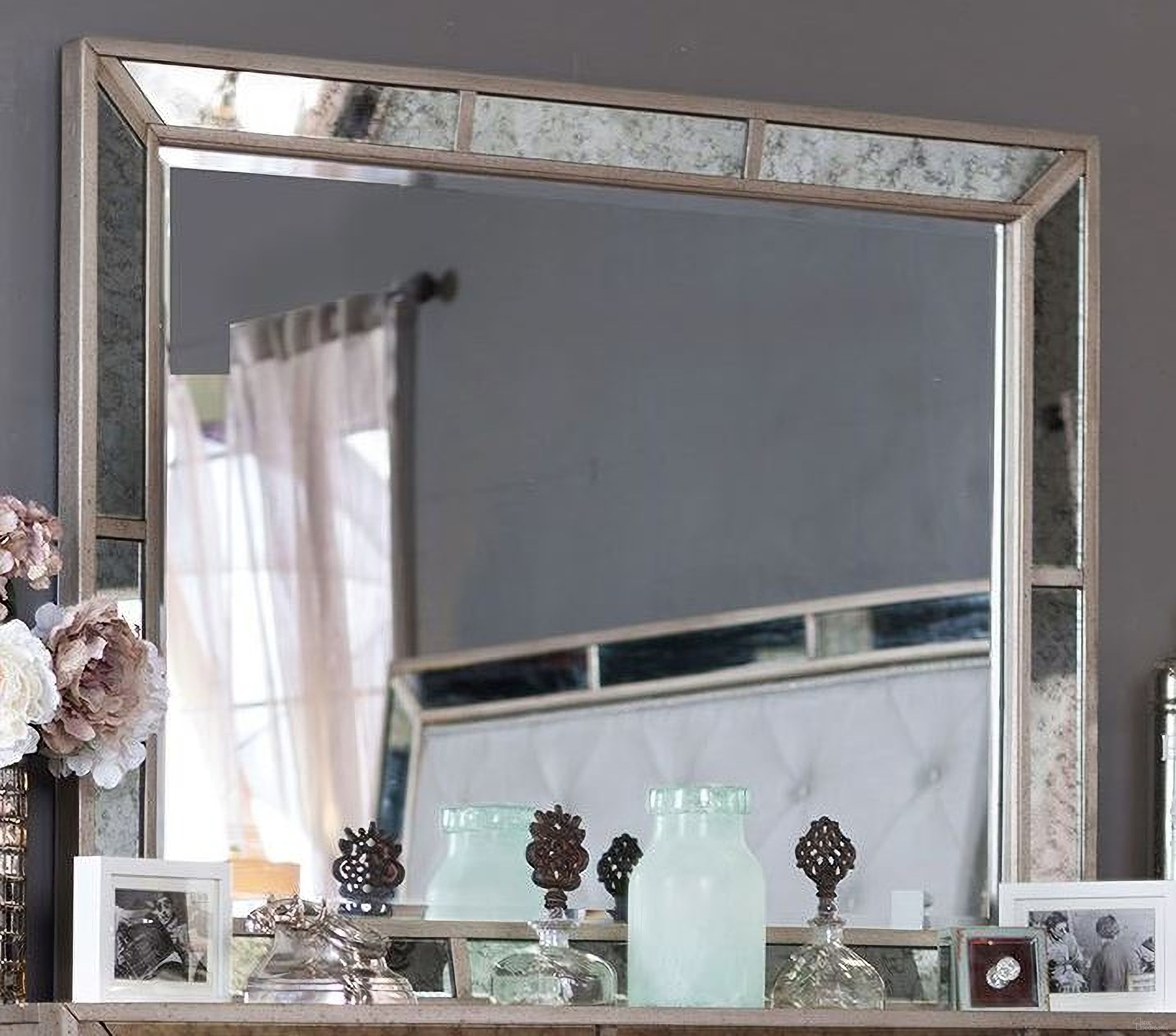 The appearance of Loraine Silver Mirror designed by Furniture of America in the modern / contemporary interior design. This silver piece of furniture was selected by 1StopBedrooms from Loraine Collection to add a touch of cosiness and style into your home. Sku: CM7195M. Material: Wood.