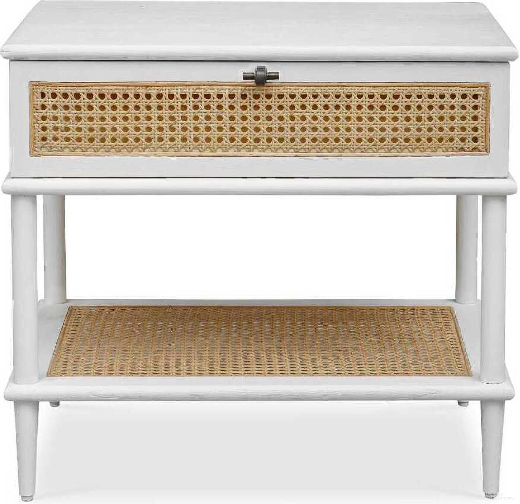 The appearance of Coast Rattan Side Table In White designed by Uttermost in the coastal interior design. This white piece of furniture  was selected by 1StopBedrooms from Coast Collection to add a touch of cosiness and style into your home. Sku: 50154. Material: Wood.