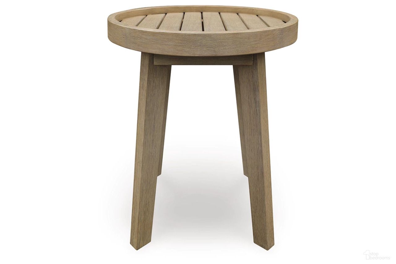 The appearance of Coastal Reef Outdoor End Table In Beige designed by Signature Design by Ashley in the transitional interior design. This beige piece of furniture was selected by 1StopBedrooms from Coastal Reef Collection to add a touch of cosiness and style into your home. Sku: NCP204-706. Table Top Shape: Round. Material: Wood.
