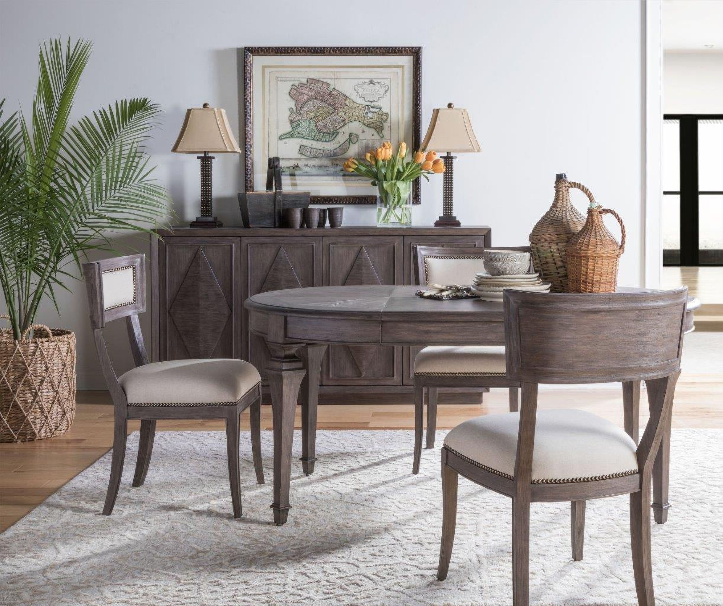 The appearance of Cohesion Program Antico Oval Extendable Dining Room Set designed by Artistica Home in the transitional interior design. This antico piece of furniture was selected by 1StopBedrooms from Cohesion Program Collection to add a touch of cosiness and style into your home. Sku: 2000-870-39;2000-880-39-01. Table Base Style: Legs. Table Top Shape: Oval. Material: Wood. Size: 42" x 42".