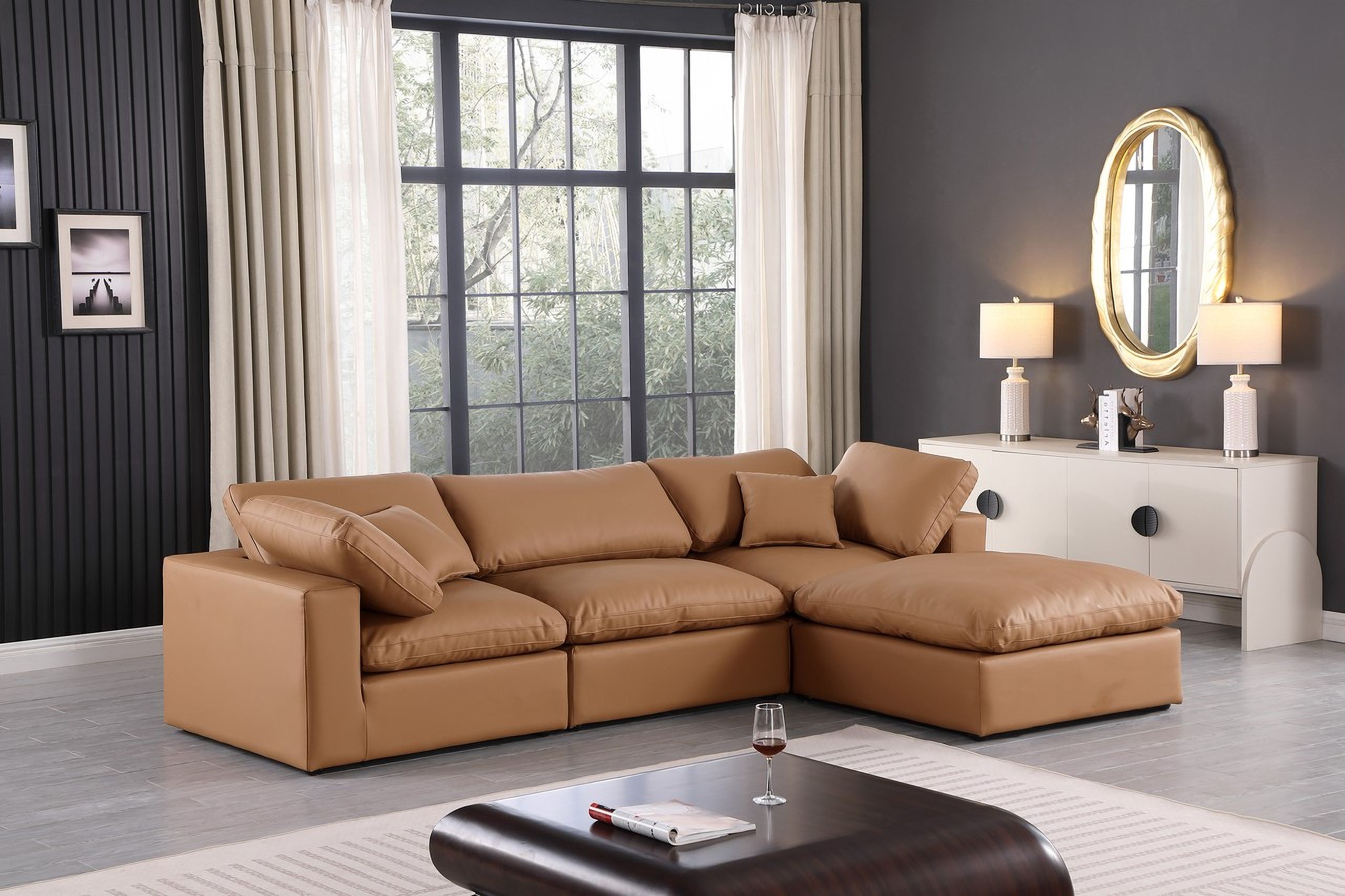 The appearance of Comfy Vegan Leather 4 Piece Modular Sectional In Cognac designed by Meridian in the modern / contemporary interior design. This cognac piece of furniture was selected by 1StopBedrooms from Comfy Collection to add a touch of cosiness and style into your home. Sku: 188Cognac-Armless;188Cognac-Corner;188Cognac-Corner;188Cognac-Ott. Material: Leather. Layout: Modular.