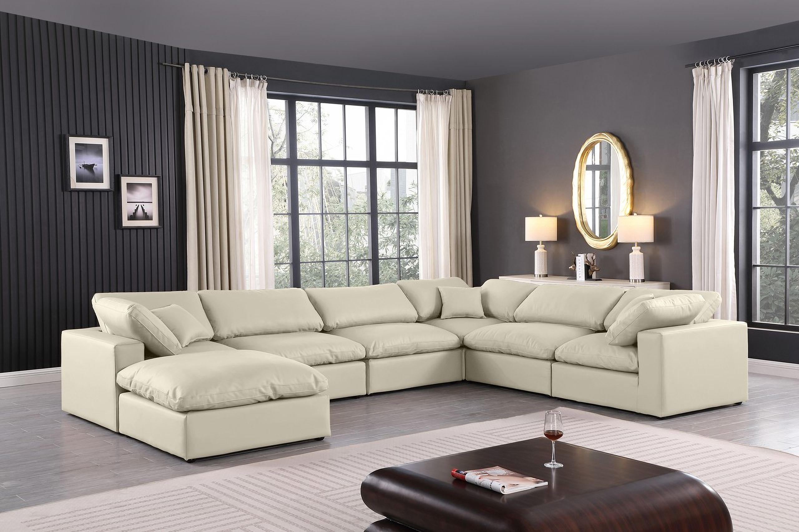 The appearance of Comfy Vegan Leather 7 Piece Modular Sectional In Cream designed by Meridian in the modern / contemporary interior design. This cream piece of furniture  was selected by 1StopBedrooms from Comfy Collection to add a touch of cosiness and style into your home. Sku: 188Cream-Armless;188Cream-Armless;188Cream-Armless;188Cream-Corner;188Cream-Corner;188Cream-Corner;188Cream-Ott. Material: Leather. Layout: Modular.