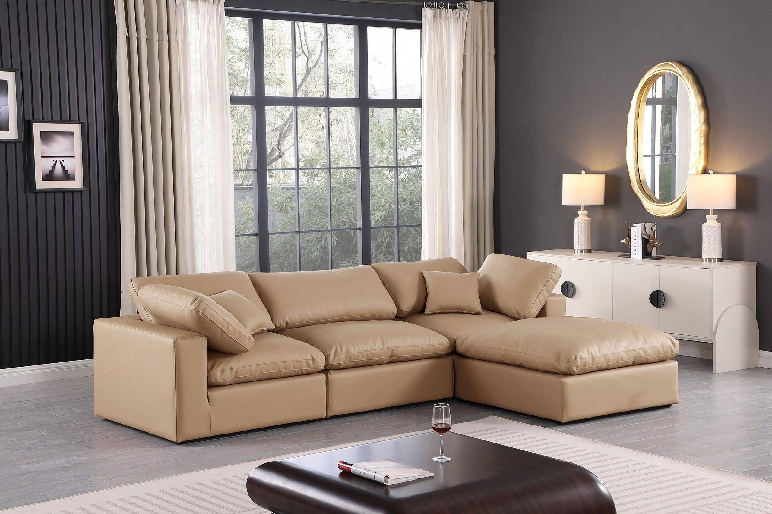 The appearance of Comfy Vegan Leather 4 Piece Modular Sectional In Tan designed by Meridian in the modern / contemporary interior design. This tan piece of furniture was selected by 1StopBedrooms from Comfy Collection to add a touch of cosiness and style into your home. Sku: 188Tan-Armless;188Tan-Corner;188Tan-Corner;188Tan-Ott. Material: Leather. Layout: Modular.