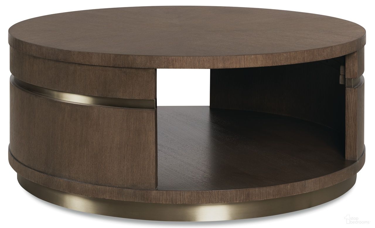 The appearance of Commerce and Market Roll With It Round Cocktail Table In Dark Wood designed by Hooker in the transitional interior design. This dark wood piece of furniture  was selected by 1StopBedrooms from Commerce and Market Collection to add a touch of cosiness and style into your home. Sku: 7228-80260-89. Material: Oak Veneer.