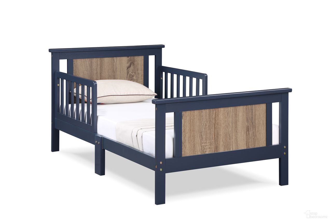 The appearance of Connelly Reversible Panel Toddler Bed In Midnight Blue and Vintage Walnut designed by Olive and Opie in the transitional interior design. This midnight blue/vintage walnut piece of furniture was selected by 1StopBedrooms from Connelly Collection to add a touch of cosiness and style into your home. Sku: 27510-MBL. Material: Wood.