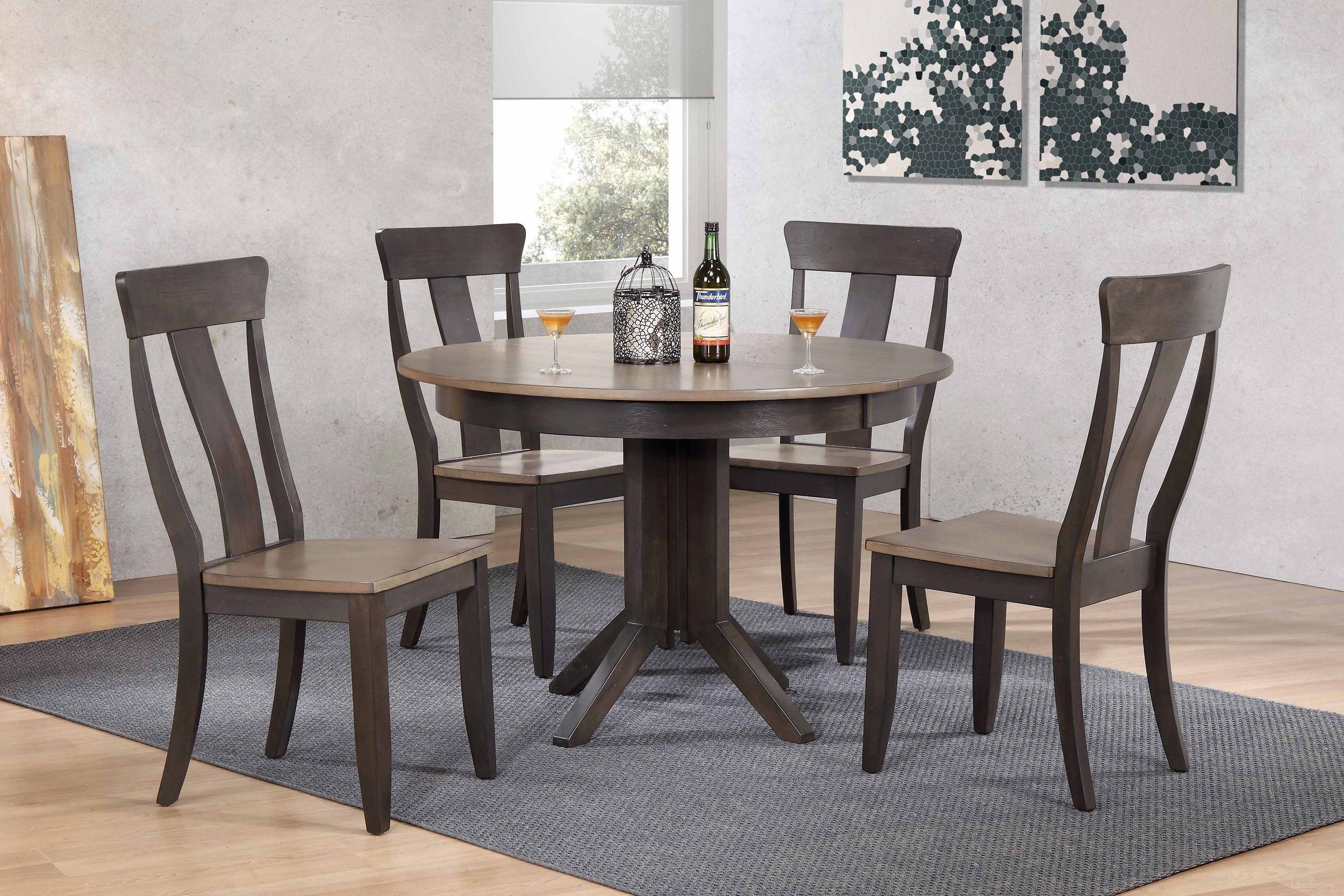 The appearance of Contemporary Panel Back 5-Piece Dining Set In Grey Stone and Black Stone designed by Iconic Furniture in the transitional interior design. This grey stone and black stone piece of furniture was selected by 1StopBedrooms from Deco & Contemporary Collection to add a touch of cosiness and style into your home. Sku: RD45CONCH57GRSBKS-5PC. Table Base Style: Pedestal. Table Top Shape: Round. Material: Rubberwood.