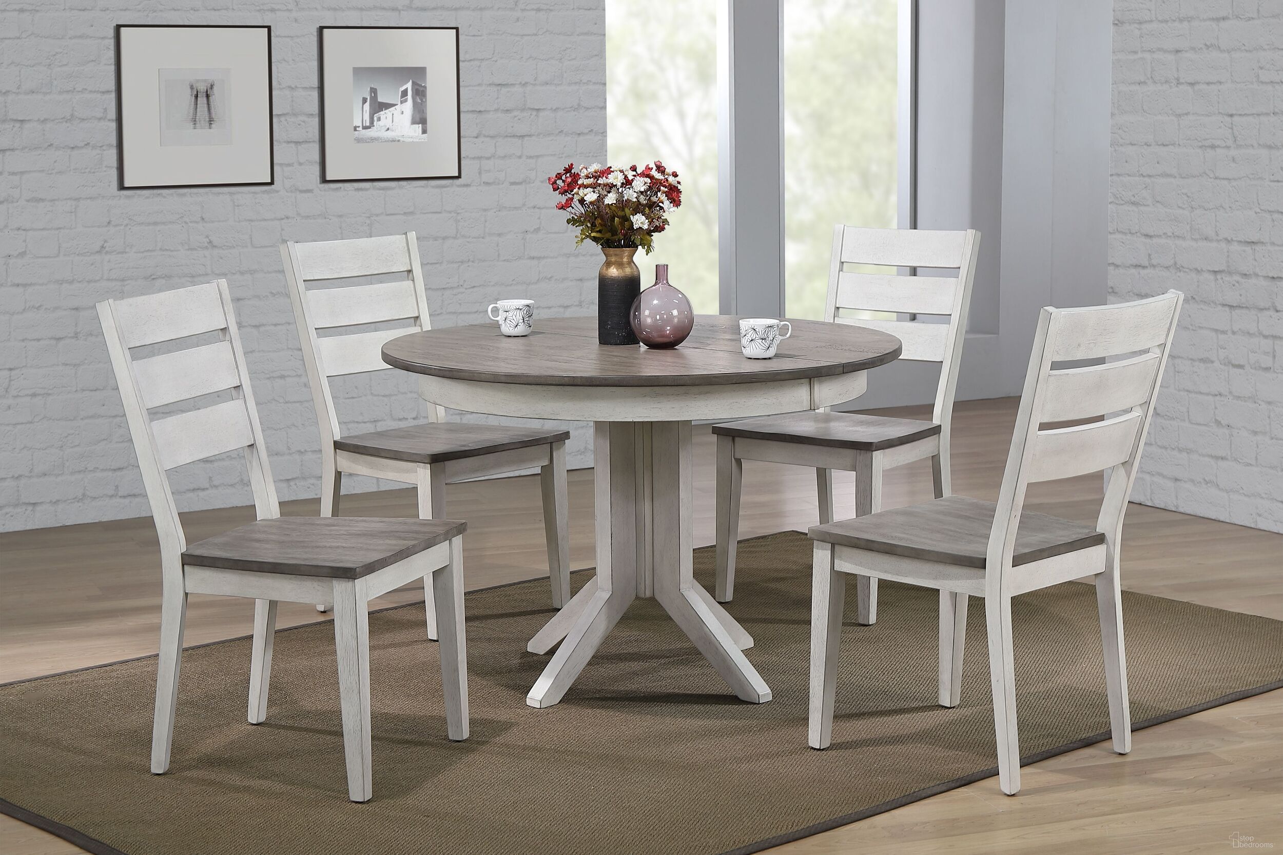 The appearance of Contemporary Table With Ladder Back Chairs 5- Piece Dining Set In Ash and Stormy White designed by Iconic Furniture in the transitional interior design. This ash and stormy white piece of furniture  was selected by 1StopBedrooms from Ash & Stormy White Collection to add a touch of cosiness and style into your home. Sku: RD45CONCH64ASHSTW-5PC. Table Base Style: Pedestal. Table Top Shape: Round. Material: Rubberwood.