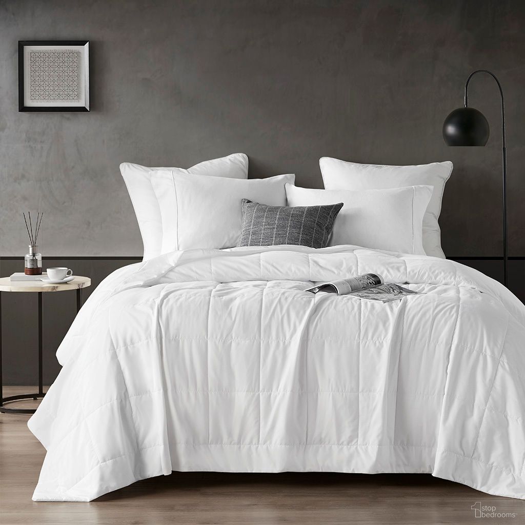 The appearance of Cooling Touch Down Alternative King Blanket In White designed by Olliix in the transitional interior design. This white piece of furniture  was selected by 1StopBedrooms from Cooling Touch Collection to add a touch of cosiness and style into your home. Sku: SI51-0013. Bed Size: King. Material: Nylon.