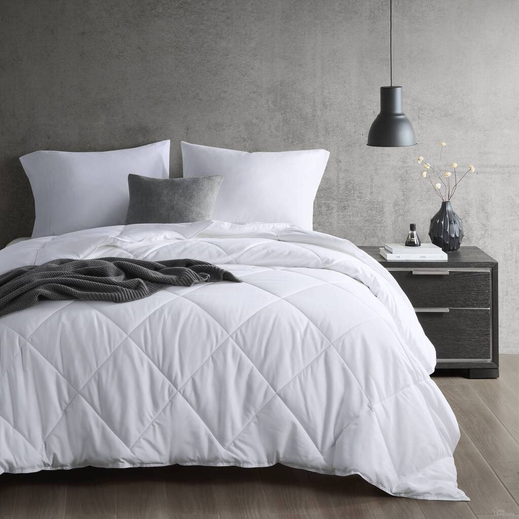 The appearance of Cooling Touch Oversized Down Alternative Full/Queen Comforter In White designed by Olliix in the transitional interior design. This white piece of furniture  was selected by 1StopBedrooms from Cooling Touch Collection to add a touch of cosiness and style into your home. Sku: SI10-0019. Bed Size: Full. Material: Nylon.