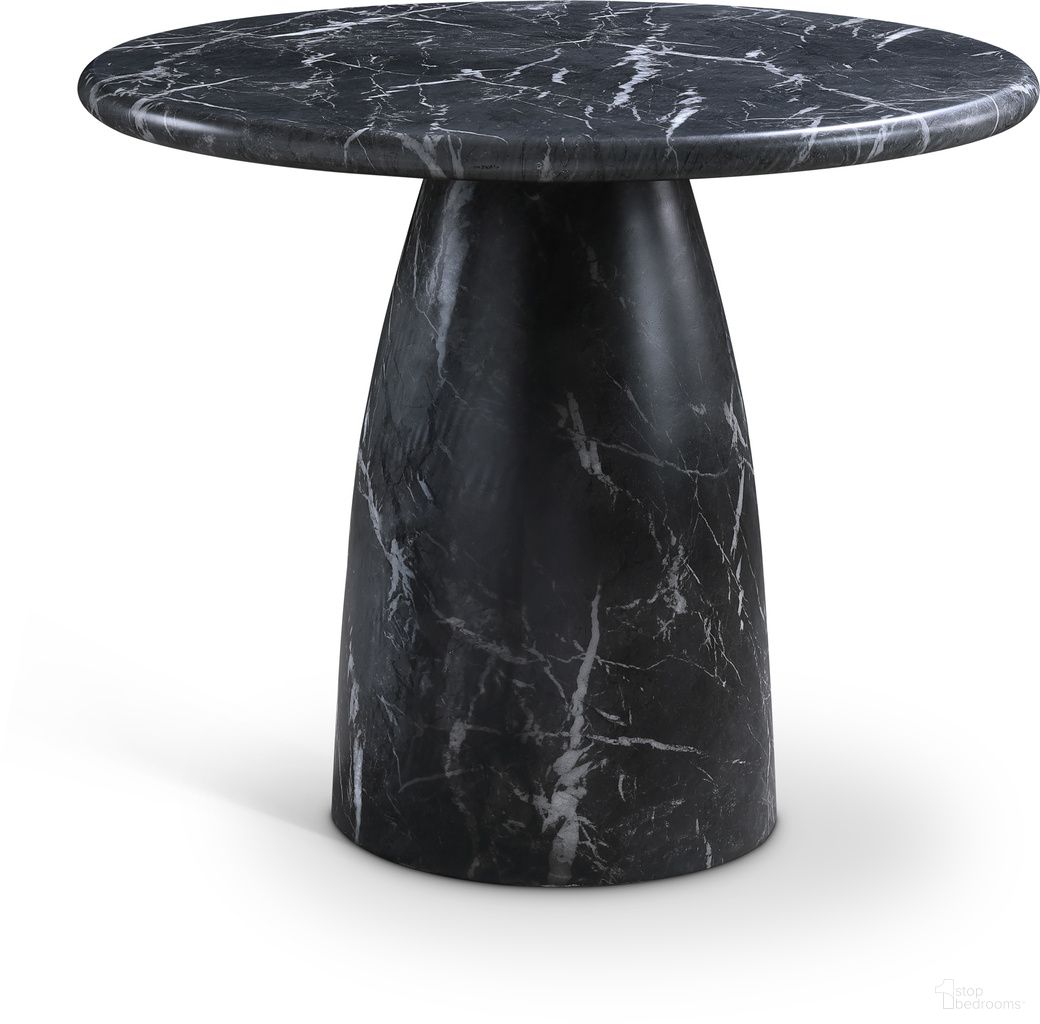 The appearance of Cosenza 36 Inch Marble Finish Concrete Dining Table In Black designed by Meridian in the modern / contemporary interior design. This black piece of furniture  was selected by 1StopBedrooms from Cosenza Collection to add a touch of cosiness and style into your home. Sku: 700Black-T Box 1/2 (Top);700Black-T Box 2/2 (Base). Table Base Style: Pedestal. Table Top Shape: Round. Material: Concrete. Size: 36".