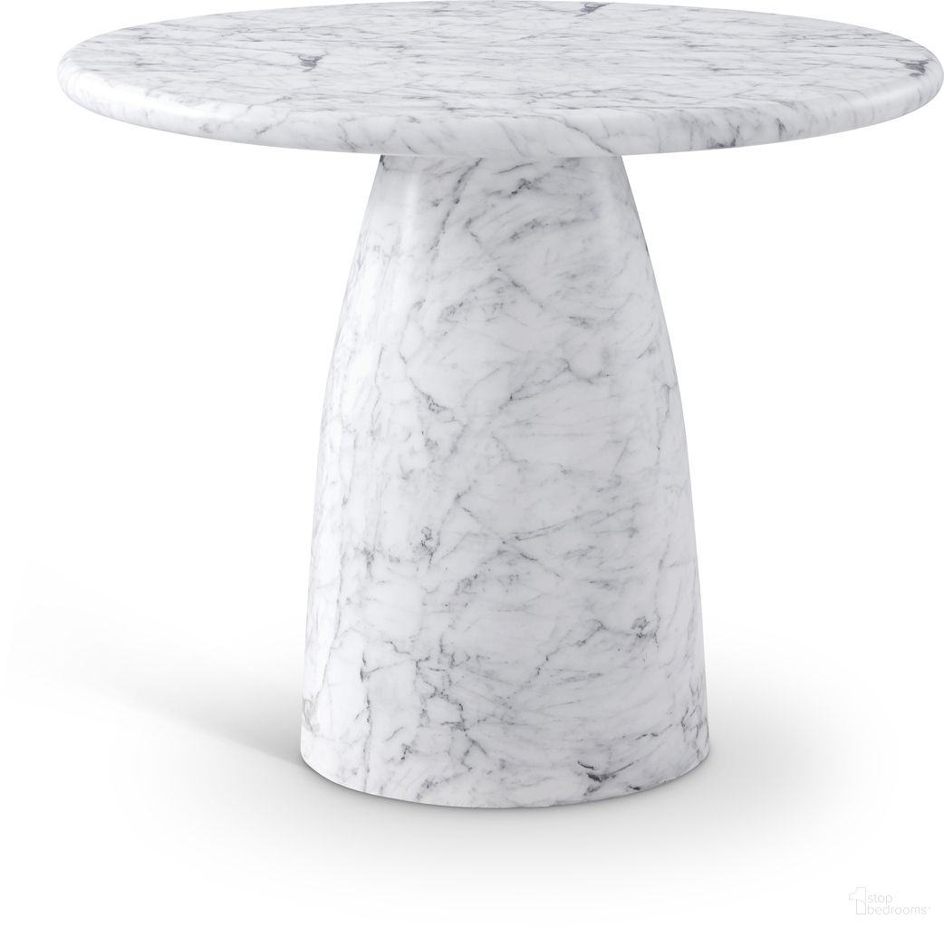 The appearance of Cosenza 36 Inch Marble Finish Concrete Dining Table In White designed by Meridian in the modern / contemporary interior design. This white piece of furniture  was selected by 1StopBedrooms from Cosenza Collection to add a touch of cosiness and style into your home. Sku: 700White-T Box 1/2 (Top);700White-T Box 2/2 (Base). Table Base Style: Pedestal. Table Top Shape: Round. Material: Concrete. Size: 36".