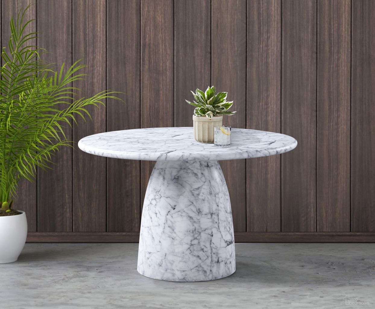 The appearance of Cosenza 48.5 Inch Marble Finish Concrete Dining Table In White designed by Meridian in the modern / contemporary interior design. This white piece of furniture  was selected by 1StopBedrooms from Cosenza Collection to add a touch of cosiness and style into your home. Sku: 701White-T Box 1/2 (Top);701White-T Box 2/2 (Base). Table Base Style: Pedestal. Table Top Shape: Round. Material: Concrete. Size: 49".