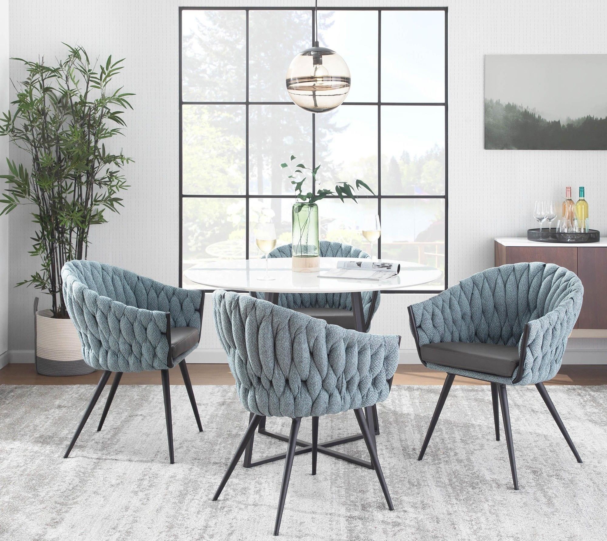 The appearance of Cosmo Black Metal And White Marble Top Dining Room Set with Braided Chair designed by Lumisource in the modern / contemporary interior design. This black and white piece of furniture was selected by 1StopBedrooms from Cosmo Collection to add a touch of cosiness and style into your home. Sku: DT-COSMO2 BKWMB;CH-BRAIDMAT BKBU. Table Base Style: Pedestal. Material: Steel. Size: 40".