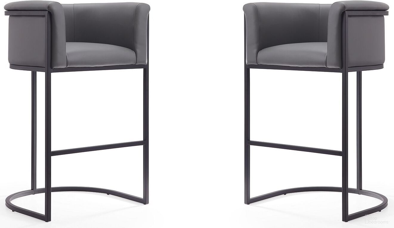 The appearance of Cosmopolitan Barstool in Grey and Black (Set of 2) designed by Manhattan Comfort in the transitional interior design. This black and grey piece of furniture was selected by 1StopBedrooms from Cosmopolitan Collection to add a touch of cosiness and style into your home. Sku: BS015-GY;BS015-GY. Material: Metal.