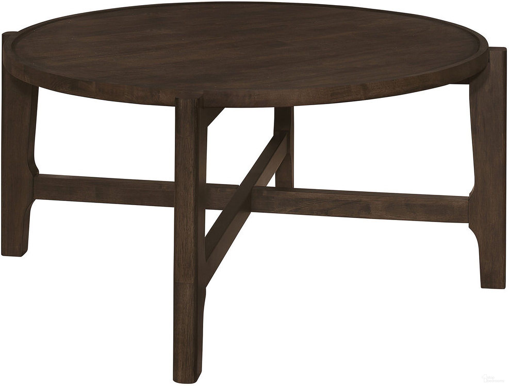 The appearance of Cota Round Solid Wood Coffee Table Dark Brown designed by Coaster in the transitional interior design. This dark brown piece of furniture  was selected by 1StopBedrooms from Cota Collection to add a touch of cosiness and style into your home. Sku: 708288. Material: Wood.