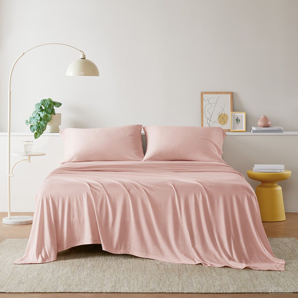 The appearance of Cotton Blend Jersey Knit All Season Sheet Set In Blush designed by Olliix in the transitional interior design. This blush piece of furniture was selected by 1StopBedrooms from Cotton Blend Jersey Knit Collection to add a touch of cosiness and style into your home. Sku: ID20-2464. Bed Size: Queen. Material: Cotton.