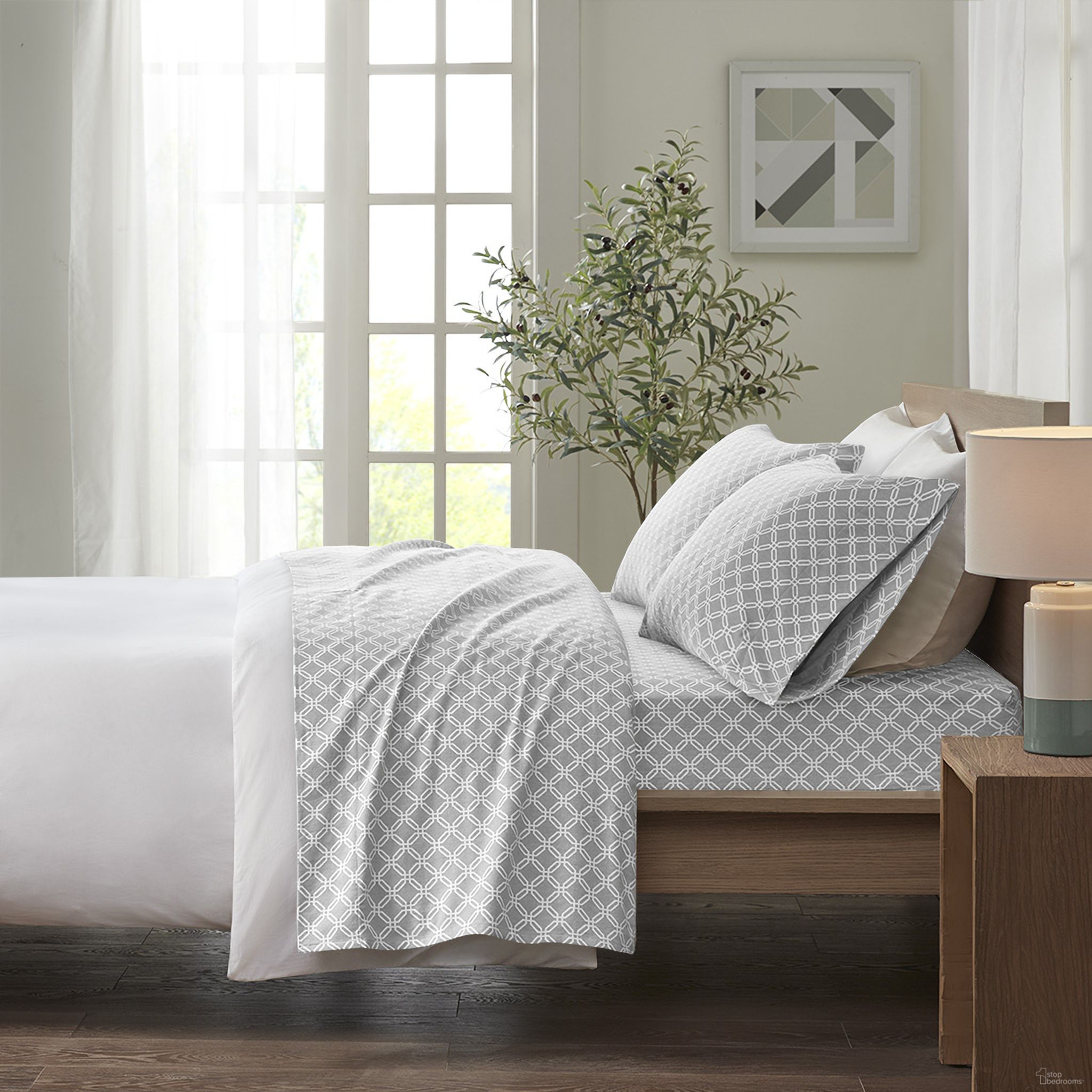 The appearance of Cozy Cotton Flannel Printed 4 Piece Queen Sheet Set In Grey Geo designed by Olliix in the transitional interior design. This grey geo piece of furniture was selected by 1StopBedrooms from Cozy Flannel Collection to add a touch of cosiness and style into your home. Sku: TN20-0242. Bed Size: Queen. Material: Cotton.