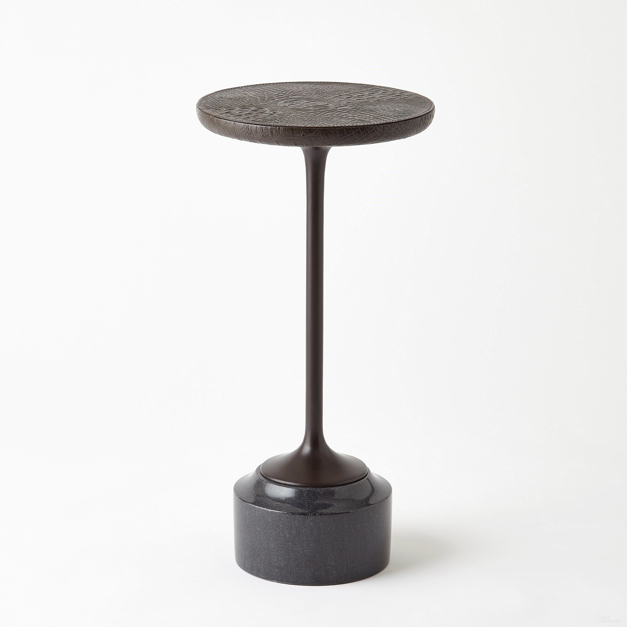 The appearance of Croc Drinks Table In Bronze designed by Global Views in the modern / contemporary interior design. This bronze piece of furniture  was selected by 1StopBedrooms from Croc Collection to add a touch of cosiness and style into your home. Sku: 993354. Material: Aluminum.