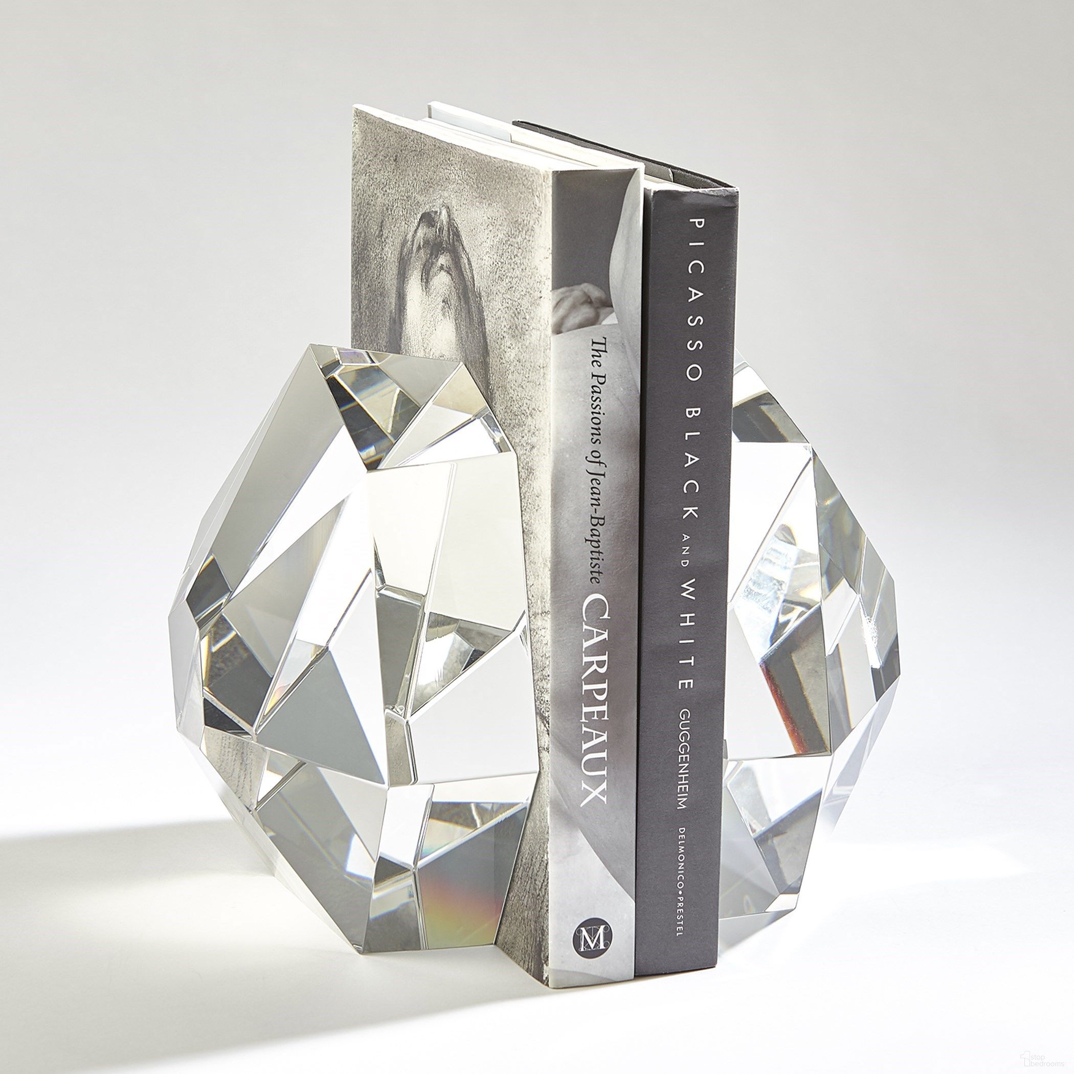 The appearance of Crystal Bookends Set of 2 In Clear designed by Global Views in the modern / contemporary interior design. This clear piece of furniture  was selected by 1StopBedrooms from Crystal Collection to add a touch of cosiness and style into your home. Sku: 882942. Material: Crystal.