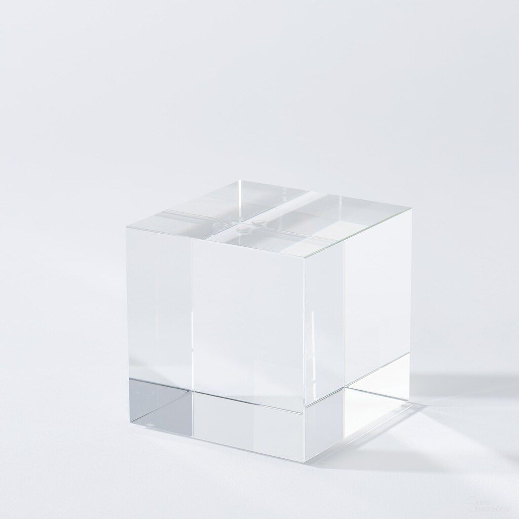 The appearance of Crystal Small Cube Riser In Clear designed by Global Views in the modern / contemporary interior design. This clear piece of furniture  was selected by 1StopBedrooms from Crystal Collection to add a touch of cosiness and style into your home. Sku: 881739. Material: Crystal.
