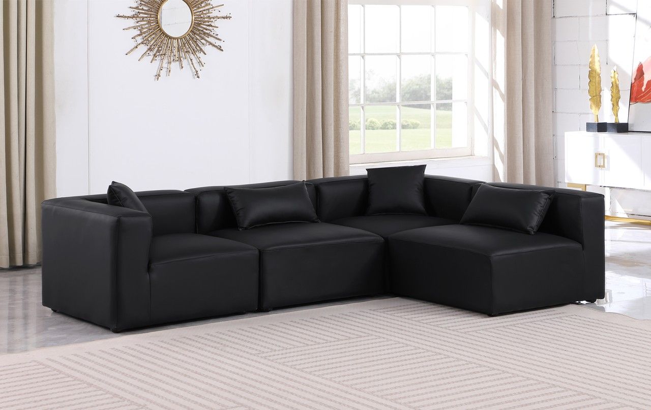 The appearance of Cube Vegan Leather 4 Piece Modular Sectional In Black designed by Meridian in the modern / contemporary interior design. This black piece of furniture  was selected by 1StopBedrooms from Cube Collection to add a touch of cosiness and style into your home. Sku: 668Black-Armless;668Black-Armless;668Black-Corner;668Black-Corner. Material: Leather. Layout: Modular.