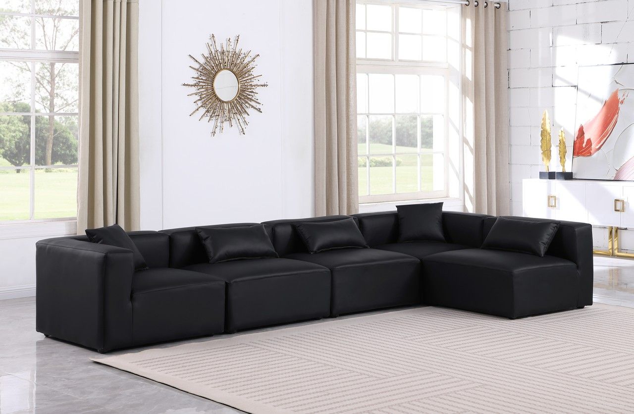 The appearance of Cube Vegan Leather 5 Piece Modular Sectional In Black designed by Meridian in the modern / contemporary interior design. This black piece of furniture  was selected by 1StopBedrooms from Cube Collection to add a touch of cosiness and style into your home. Sku: 668Black-Armless;668Black-Armless;668Black-Armless;668Black-Corner;668Black-Corner. Material: Leather. Layout: Modular.