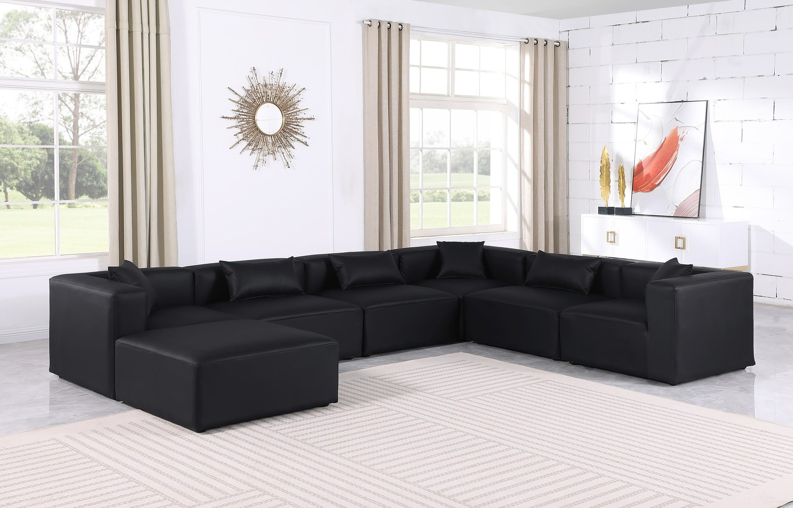 The appearance of Cube Vegan Leather 7 Piece Modular Sectional In Black designed by Meridian in the modern / contemporary interior design. This black piece of furniture  was selected by 1StopBedrooms from Cube Collection to add a touch of cosiness and style into your home. Sku: 668Black-Armless;668Black-Armless;668Black-Armless;668Black-Corner;668Black-Corner;668Black-Corner;668Black-Ott. Material: Leather. Layout: Modular.