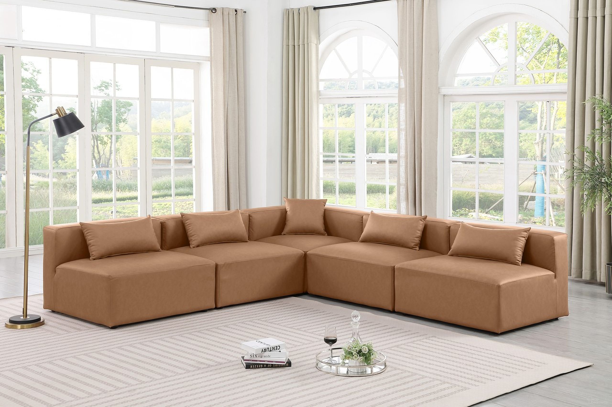 The appearance of Cube Vegan Leather 5 Piece Modular Sectional In Brown designed by Meridian in the modern / contemporary interior design. This brown piece of furniture was selected by 1StopBedrooms from Cube Collection to add a touch of cosiness and style into your home. Sku: 668Brown-Armless;668Brown-Armless;668Brown-Armless;668Brown-Armless;668Brown-Corner. Material: Leather. Layout: Modular.