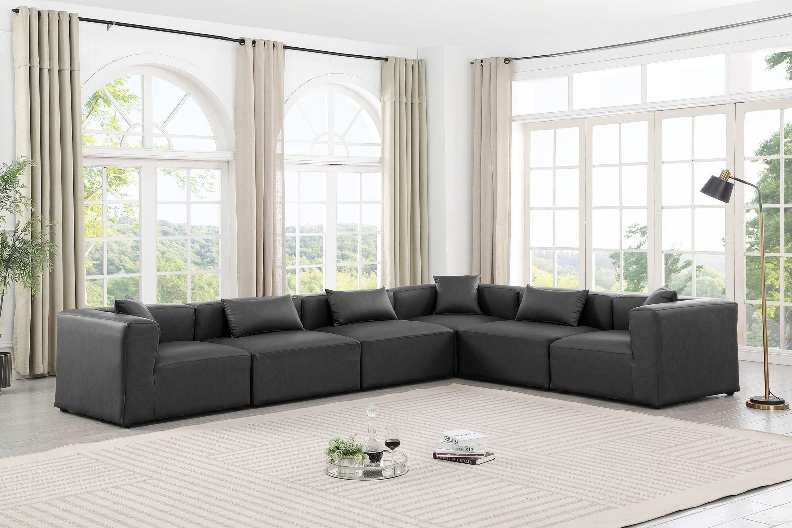 The appearance of Cube Vegan Leather 6 Piece Modular Sectional In Charcoal Grey designed by Meridian in the modern / contemporary interior design. This charcoal grey piece of furniture  was selected by 1StopBedrooms from Cube Collection to add a touch of cosiness and style into your home. Sku: 668Grey-Armless;668Grey-Armless;668Grey-Armless;668Grey-Corner;668Grey-Corner;668Grey-Corner. Material: Leather. Layout: Modular.
