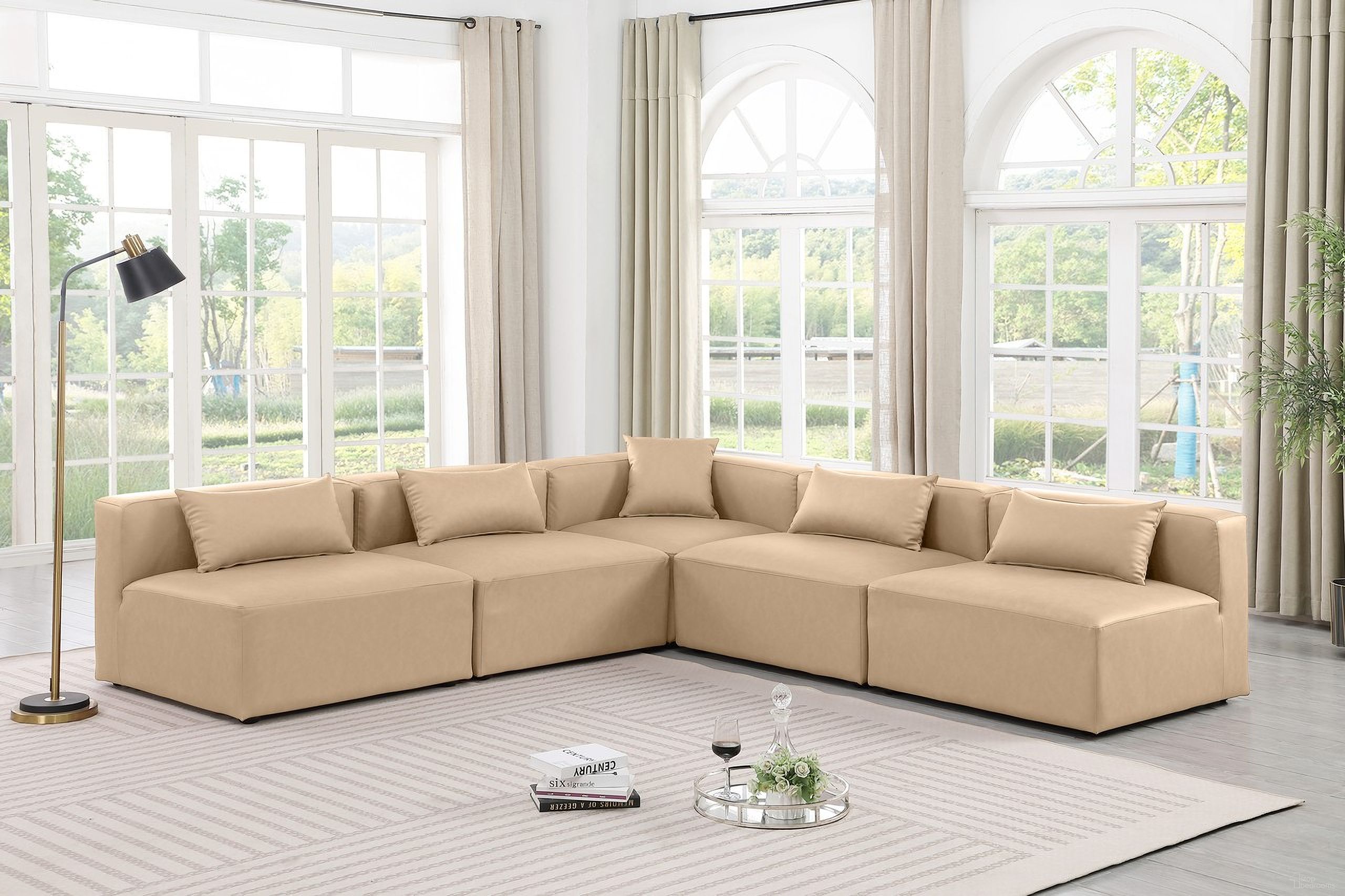 The appearance of Cube Vegan Leather 5 Piece Modular Sectional In Tan designed by Meridian in the modern / contemporary interior design. This tan piece of furniture  was selected by 1StopBedrooms from Cube Collection to add a touch of cosiness and style into your home. Sku: 668Tan-Armless;668Tan-Armless;668Tan-Armless;668Tan-Armless;668Tan-Corner. Material: Leather. Layout: Modular.