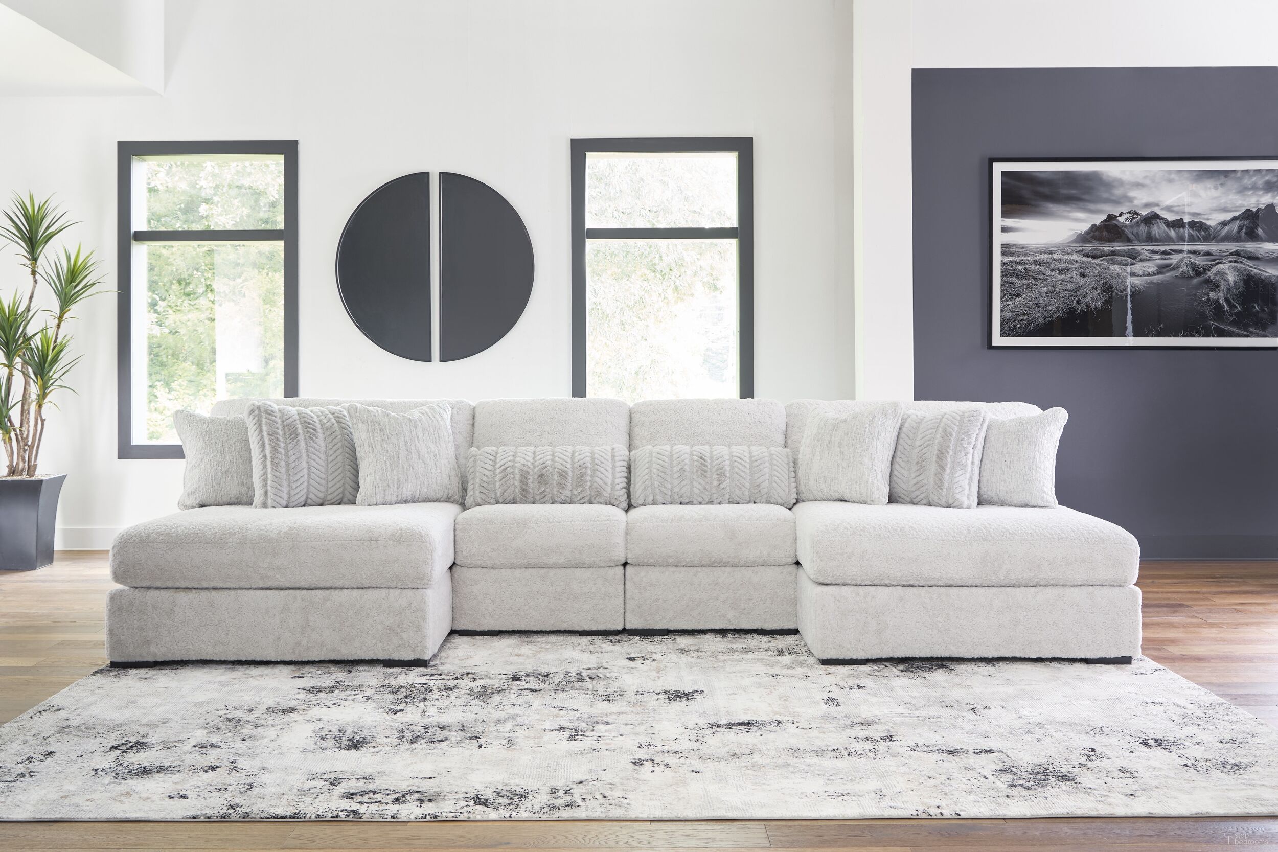 The appearance of Cuddlesome 4-Piece Sectional with Chaise In Arctic designed by Signature Design by Ashley in the modern / contemporary interior design. This arctic piece of furniture was selected by 1StopBedrooms from Cuddlesome Collection to add a touch of cosiness and style into your home. Sku: NC5910615;NC5910615;NC5910646;NC5910646. Material: Polyester. Layout: U-Shape.