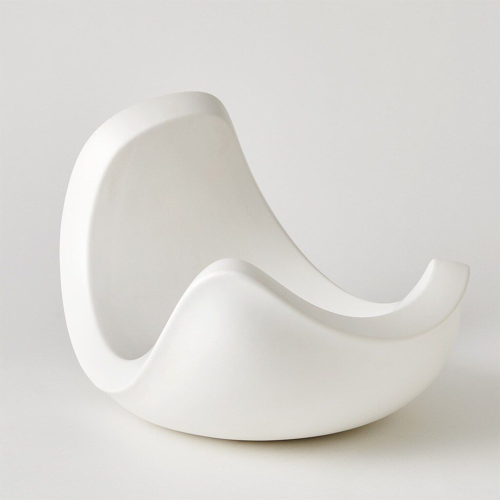 The appearance of Curl Large Bowl In Matte White designed by Global Views in the modern / contemporary interior design. This matte white piece of furniture  was selected by 1StopBedrooms from Curl Collection to add a touch of cosiness and style into your home. Sku: 110968. Material: Wood.