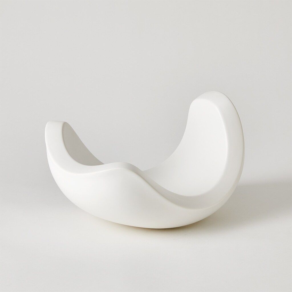The appearance of Curl Small Bowl In Matte White designed by Global Views in the modern / contemporary interior design. This matte white piece of furniture  was selected by 1StopBedrooms from Curl Collection to add a touch of cosiness and style into your home. Sku: 110969. Material: Wood.