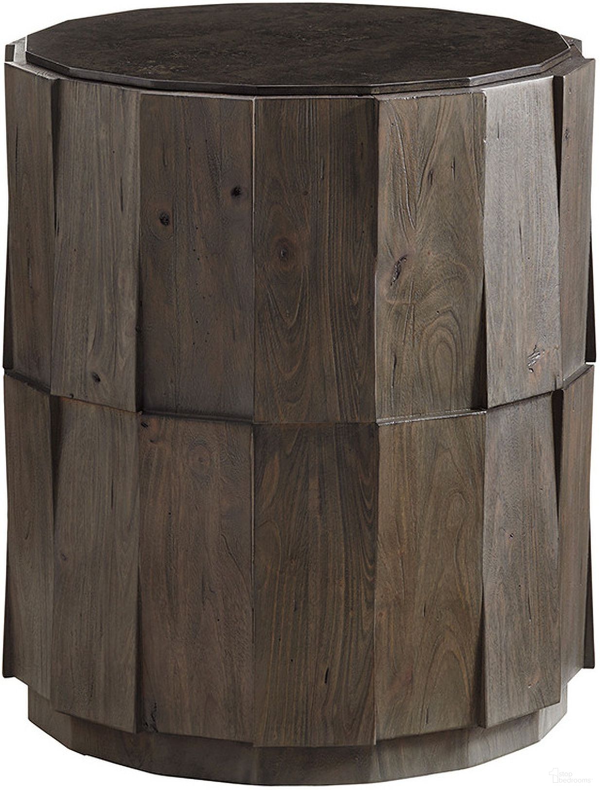 The appearance of Cypress Point Everett Round Travertine End Table In Smoke Gray designed by Tommy Bahama in the transitional interior design. This smoke gray piece of furniture was selected by 1StopBedrooms from Cypress Point Collection to add a touch of cosiness and style into your home. Sku: 562-951. Material: Wood.