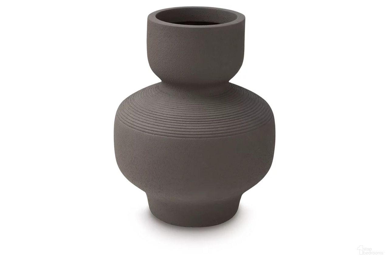 The appearance of Dalsen Large Vase In Brown designed by Signature Design by Ashley in the transitional interior design. This brown piece of furniture was selected by 1StopBedrooms from Dalsen Collection to add a touch of cosiness and style into your home. Sku: A2000873.