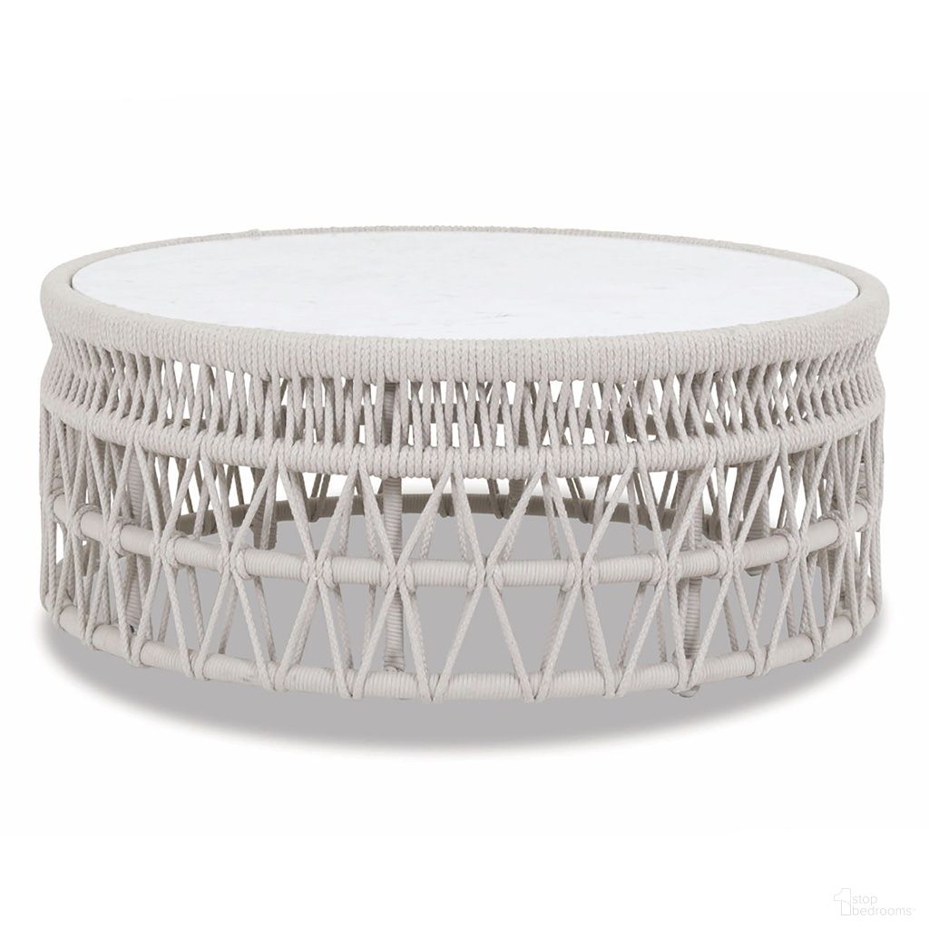 The appearance of Dana Coffee Table with Honed Carrara Marble Top in Beige designed by Sunset West in the transitional interior design. This beige piece of furniture was selected by 1StopBedrooms from Dana Collection to add a touch of cosiness and style into your home. Sku: SW4301-CT. Material: Olefin Rope.