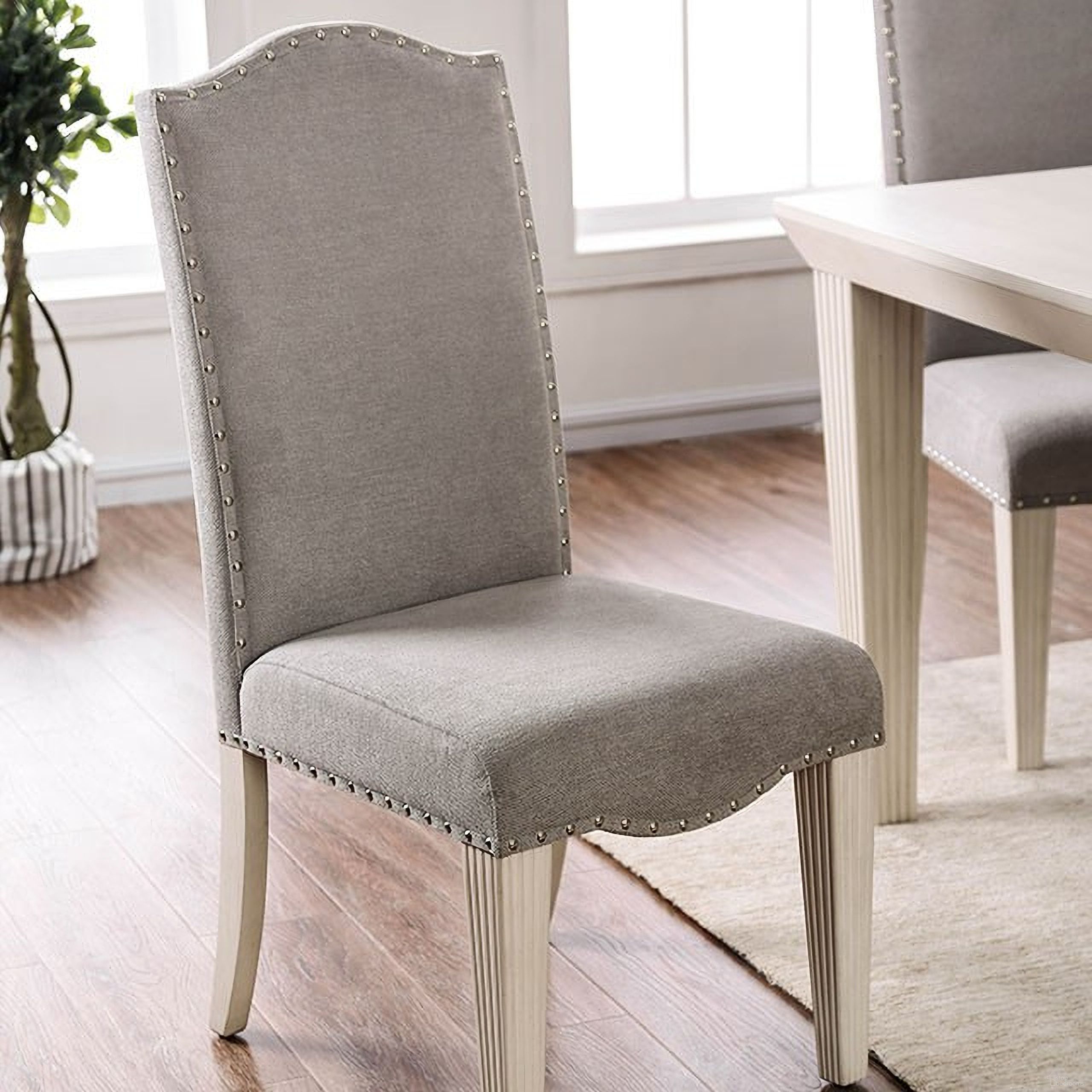 The appearance of Daniella Side Chair (Set of 2) designed by Furniture of America in the transitional interior design. This two-tone color piece of furniture was selected by 1StopBedrooms from Daniella Collection to add a touch of cosiness and style into your home. Sku: CM3630SC-2PK. Material: Fabric. Chair Type: Side Chair.