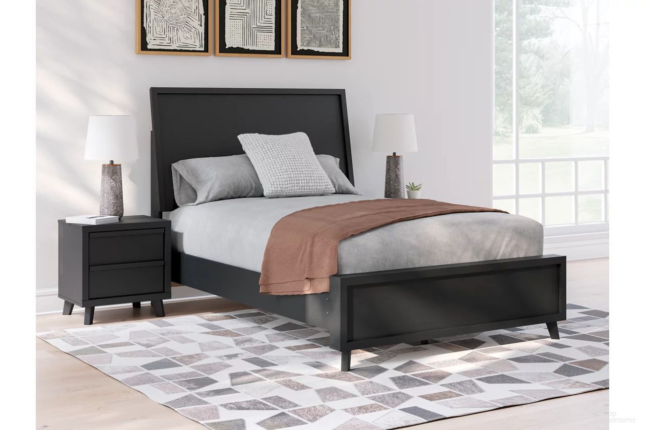 The appearance of Danziar Youth Panel Bedroom Set In Black designed by Signature Design by Ashley in the modern / contemporary interior design. This black piece of furniture was selected by 1StopBedrooms from Danziar Collection to add a touch of cosiness and style into your home. Sku: B100-12;B1013-84;B1013-87;B1013-89;B1013-92. Material: Wood. Bed Size: Full.