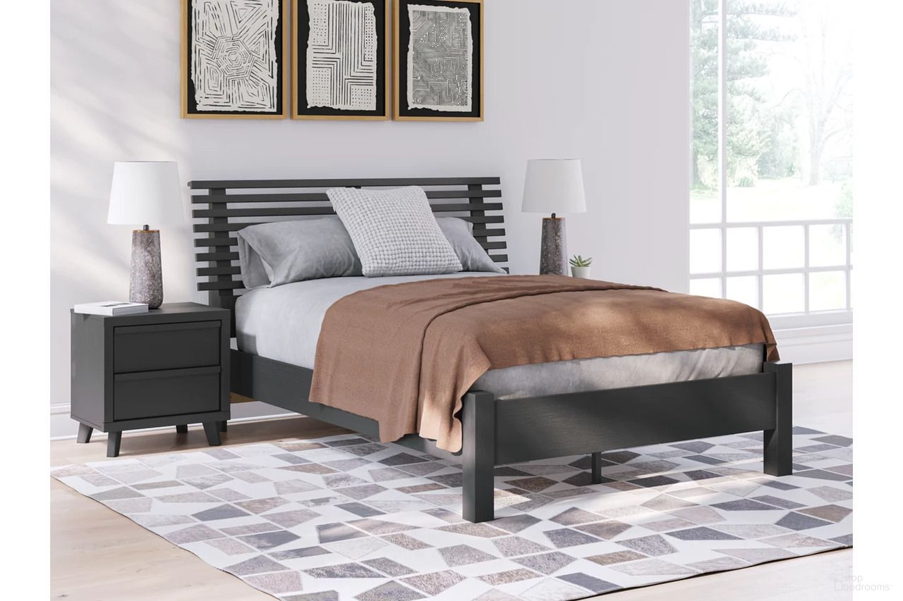 The appearance of Danziar Youth Slat Panel Bedroom Set In Black designed by Signature Design by Ashley in the modern / contemporary interior design. This black piece of furniture was selected by 1StopBedrooms from Danziar Collection to add a touch of cosiness and style into your home. Sku: B100-12;B1013-184;B1013-187;B1013-92. Material: Wood. Bed Size: Full.